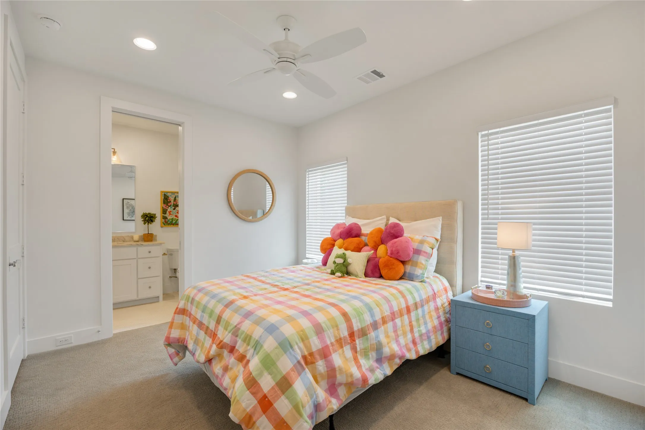 Upstairs bedroom with connected bath and walk-in closet.