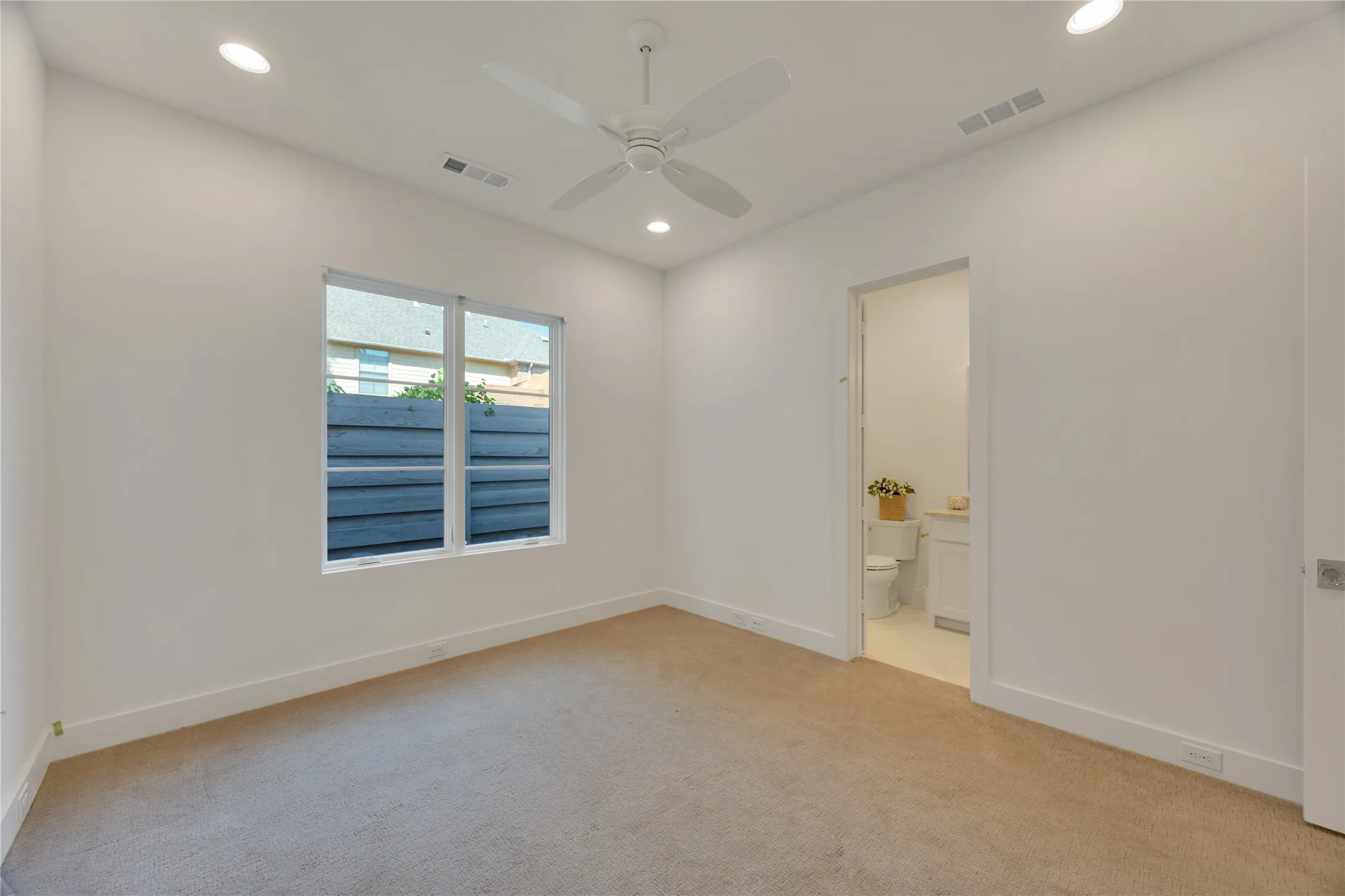 This bedroom is on the first floor toward the back of the home, so it's private and is spacious. Private bath and walk-in closet.