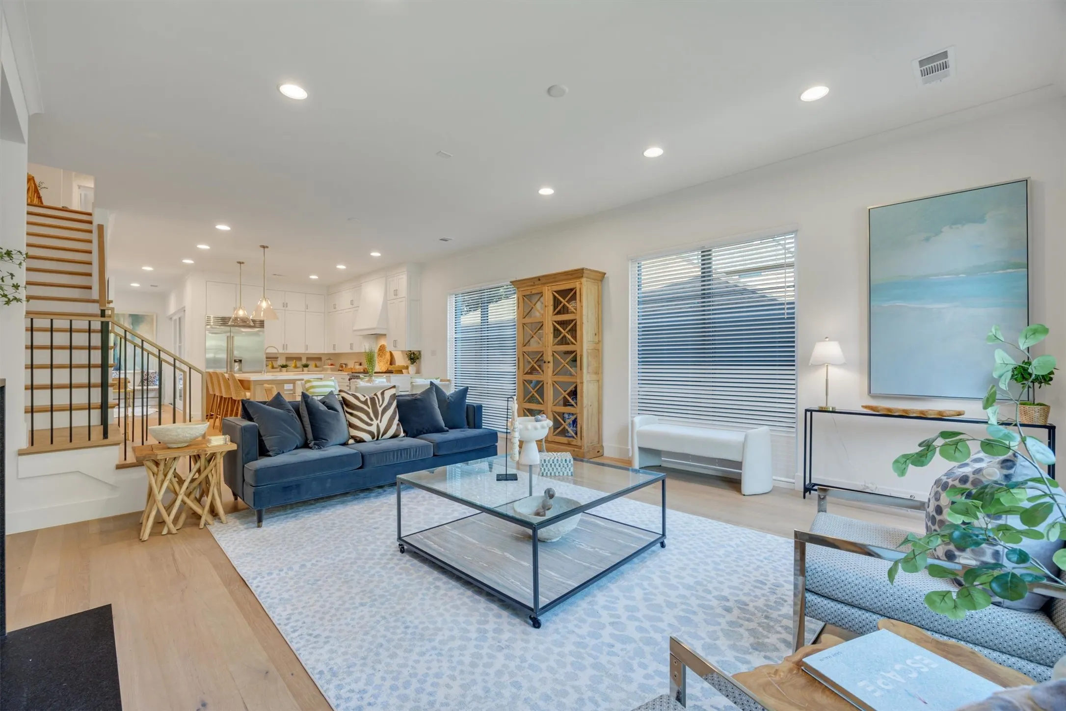 The downstairs living area is a spacious and bright place to gather and entertain.
