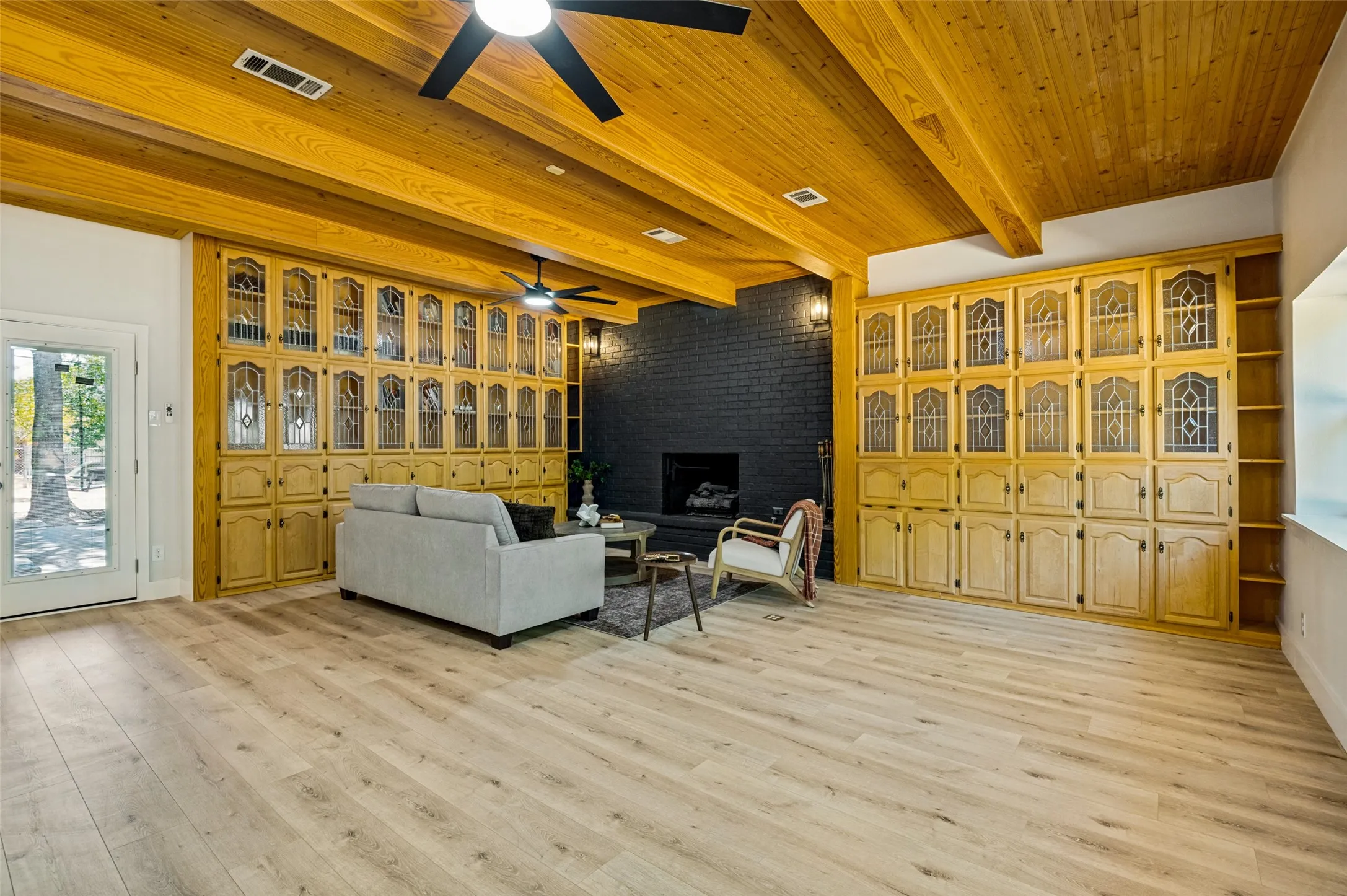 Vaulted wood-paneled ceiling with exposed beams