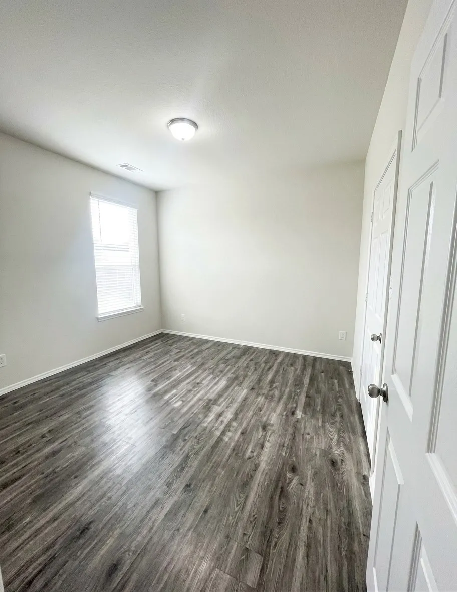 Bedroom 3 with door leading to bathroom
