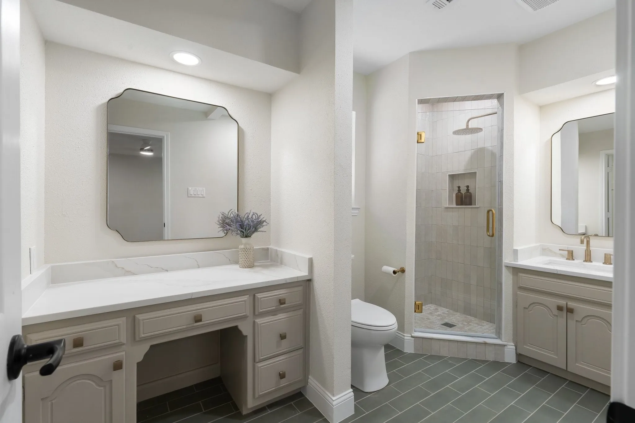 Fresh paint, new quartz, lighting, toilet, mirrors and faucets