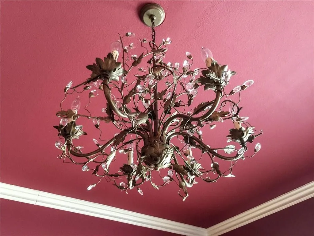Ornate chandelier with decorative crystal accents