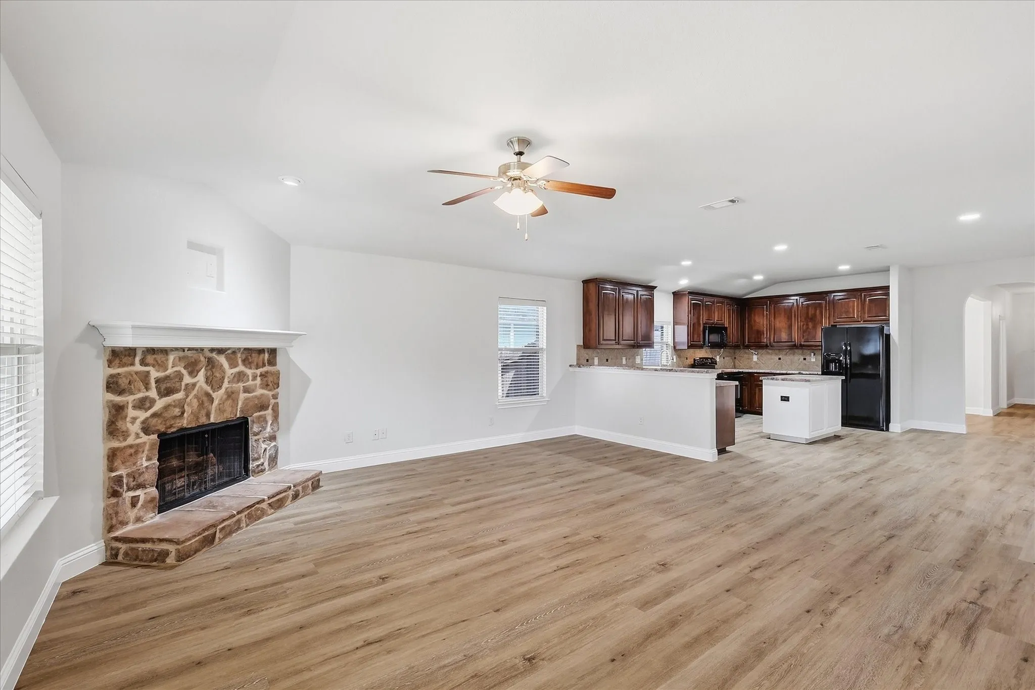 Vaulted ceiling and wood-finish flooring