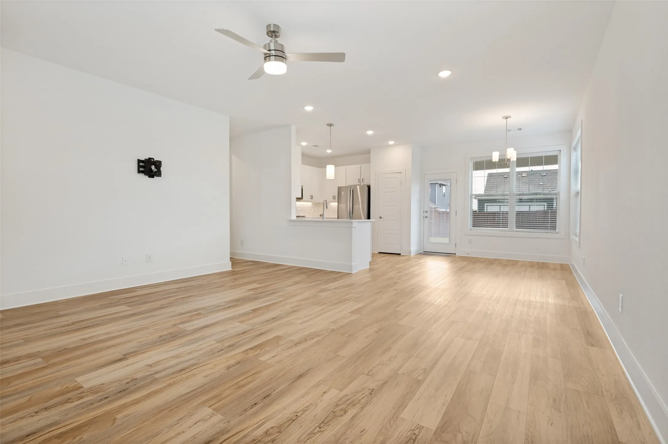 Wood-finish flooring throughout the main living areas