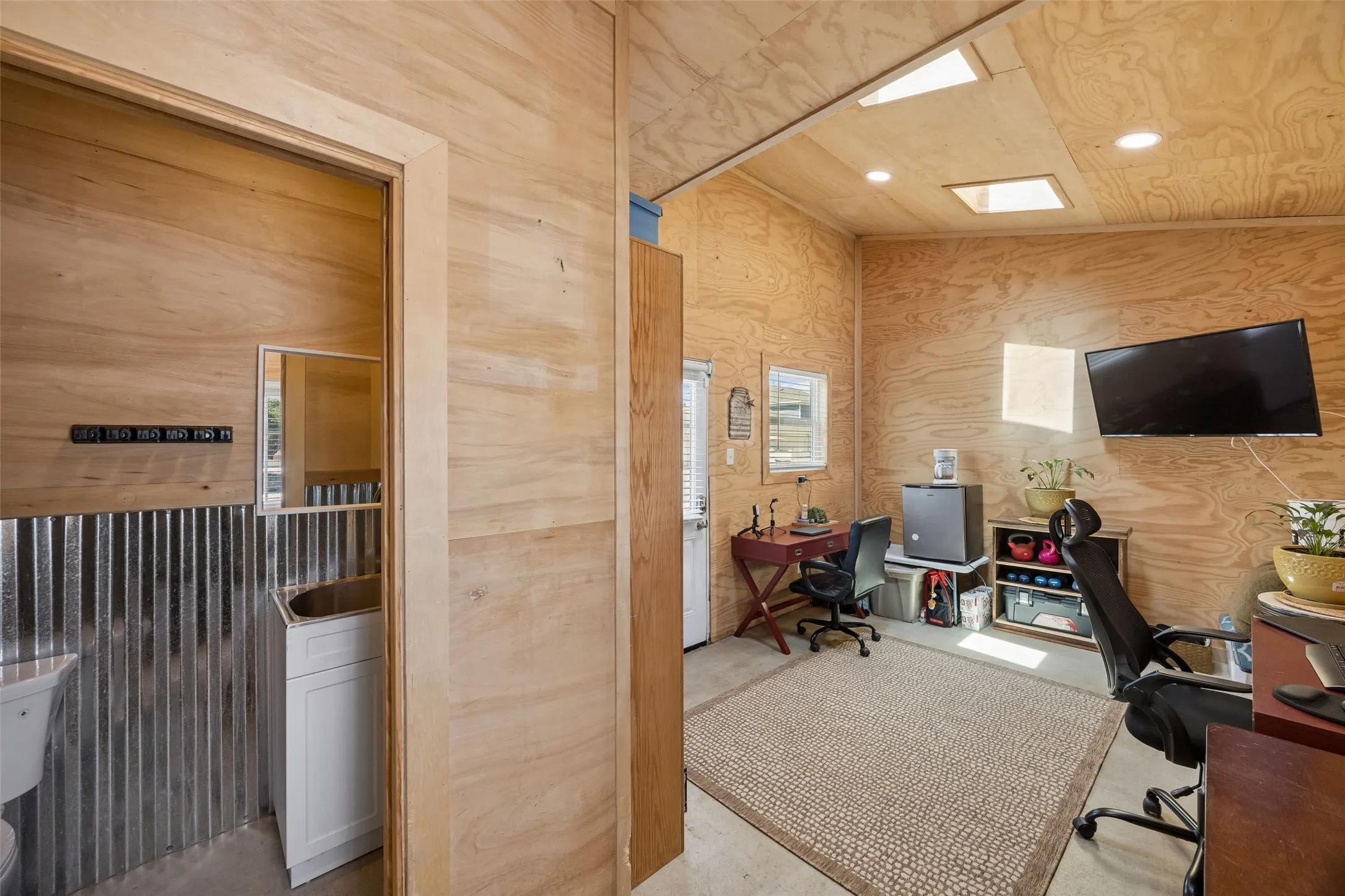 Separate unit in the back has over 220 sq feet, separate entrance, mini-split heating and air conditioning & half bath