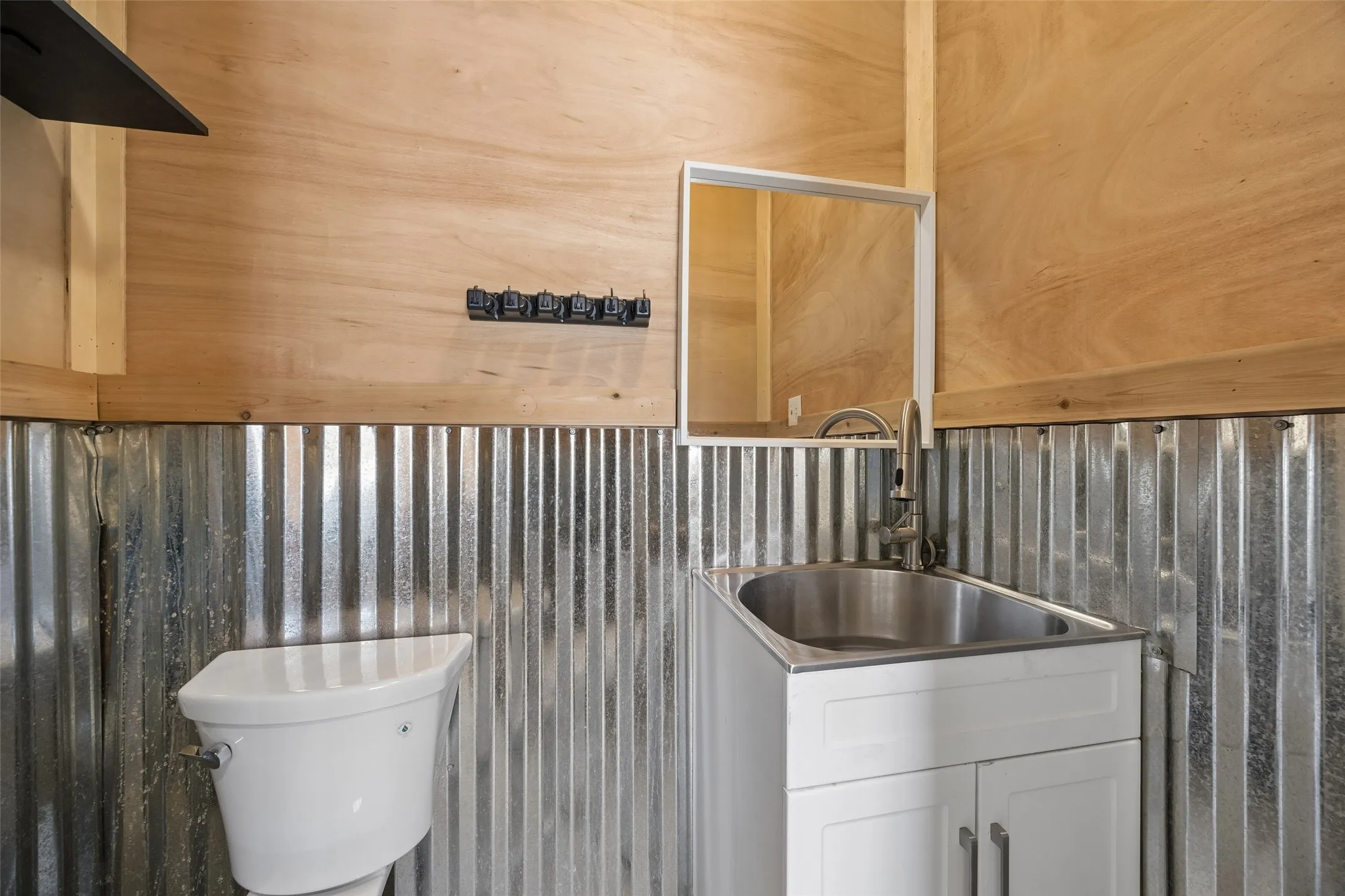 Separate unit in the back has over 220 sq feet, separate entrance, mini-split heating and air conditioning & half bath