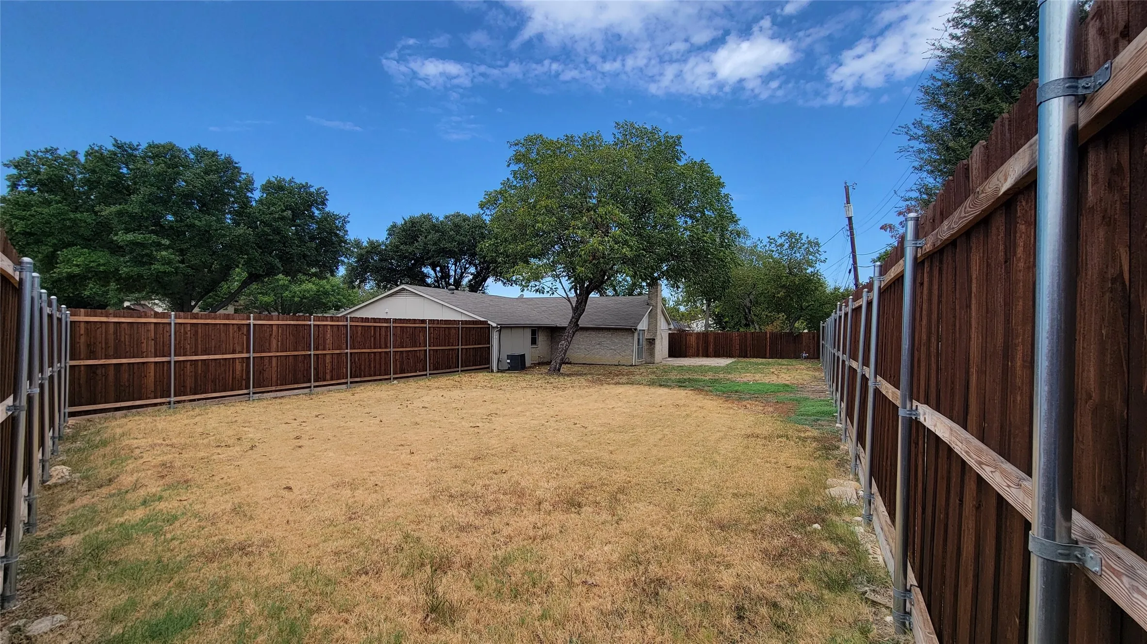 Huge back yard and tall privacy fence
