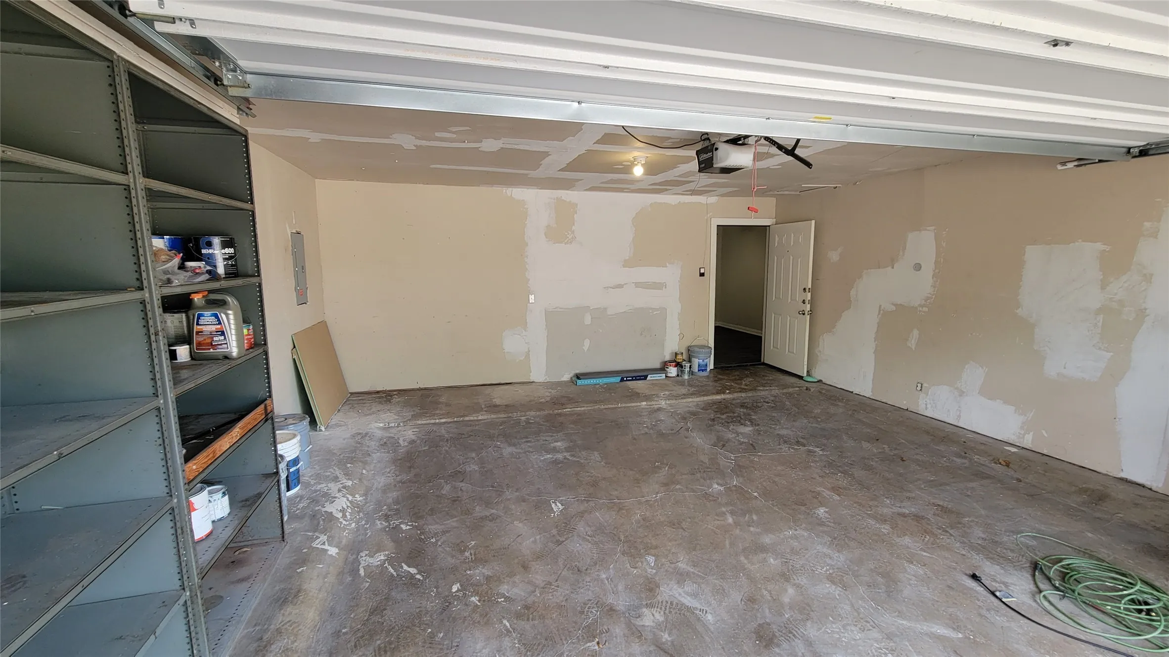 Full sized garage with extra shelving