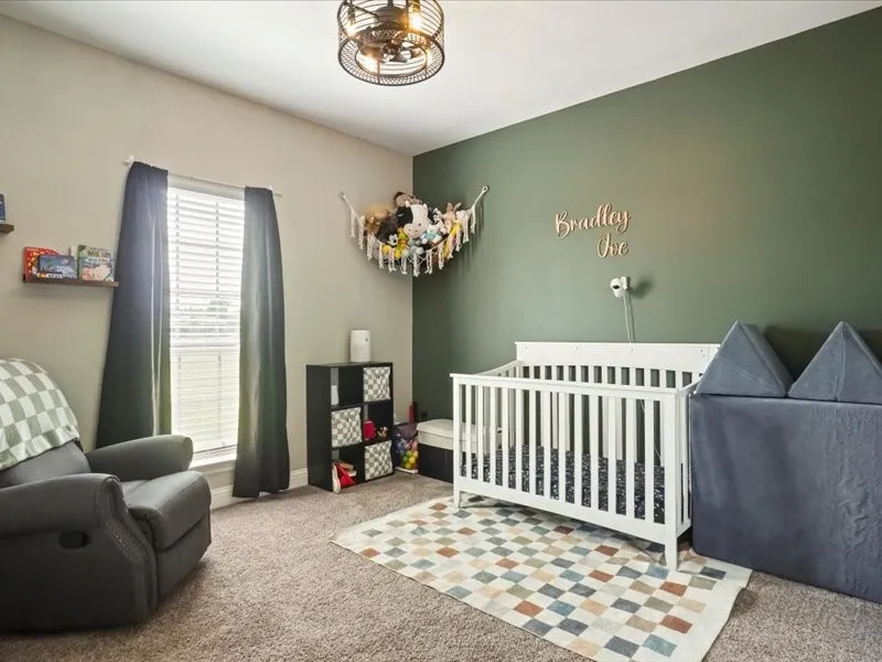 Recessed ceiling, neutral wall paint, accent wall, light-filtering window blinds, and overhead lighting