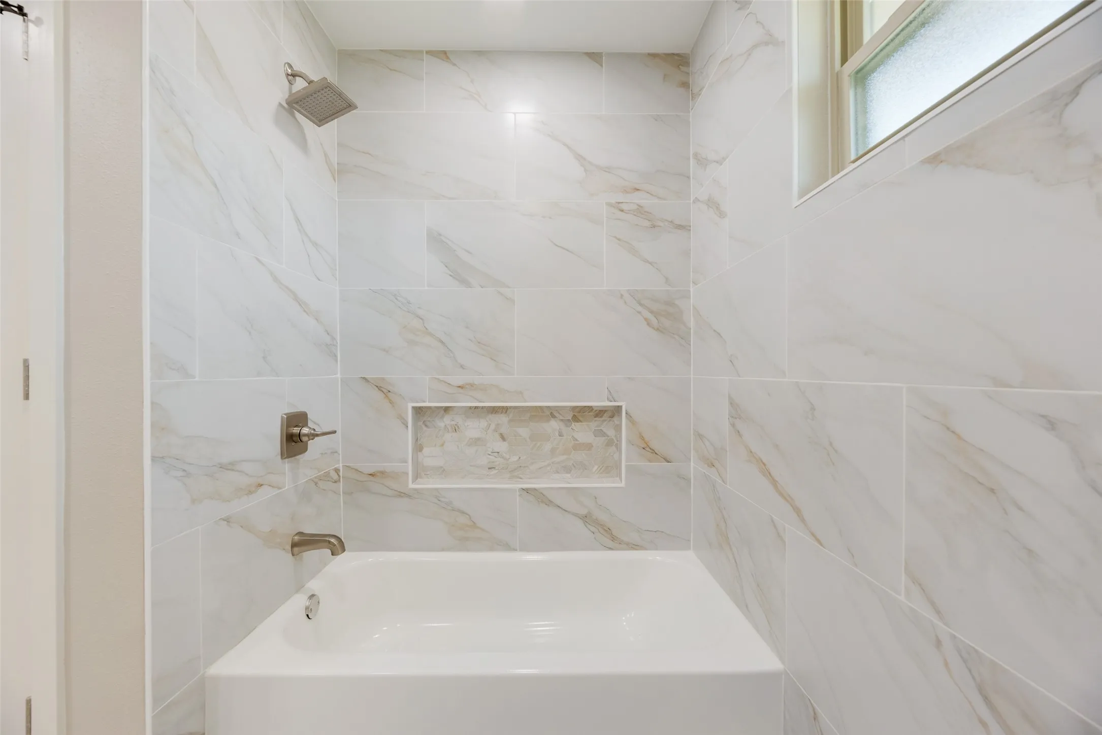 Full bathroom featuring washtub / shower combination