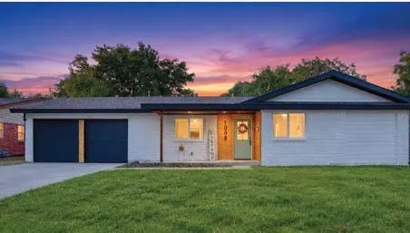 Grass is AI generated to enhance listing photo