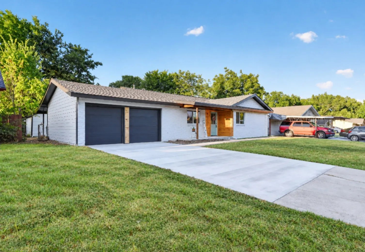 Grass is AI generated to enhance listing photo
