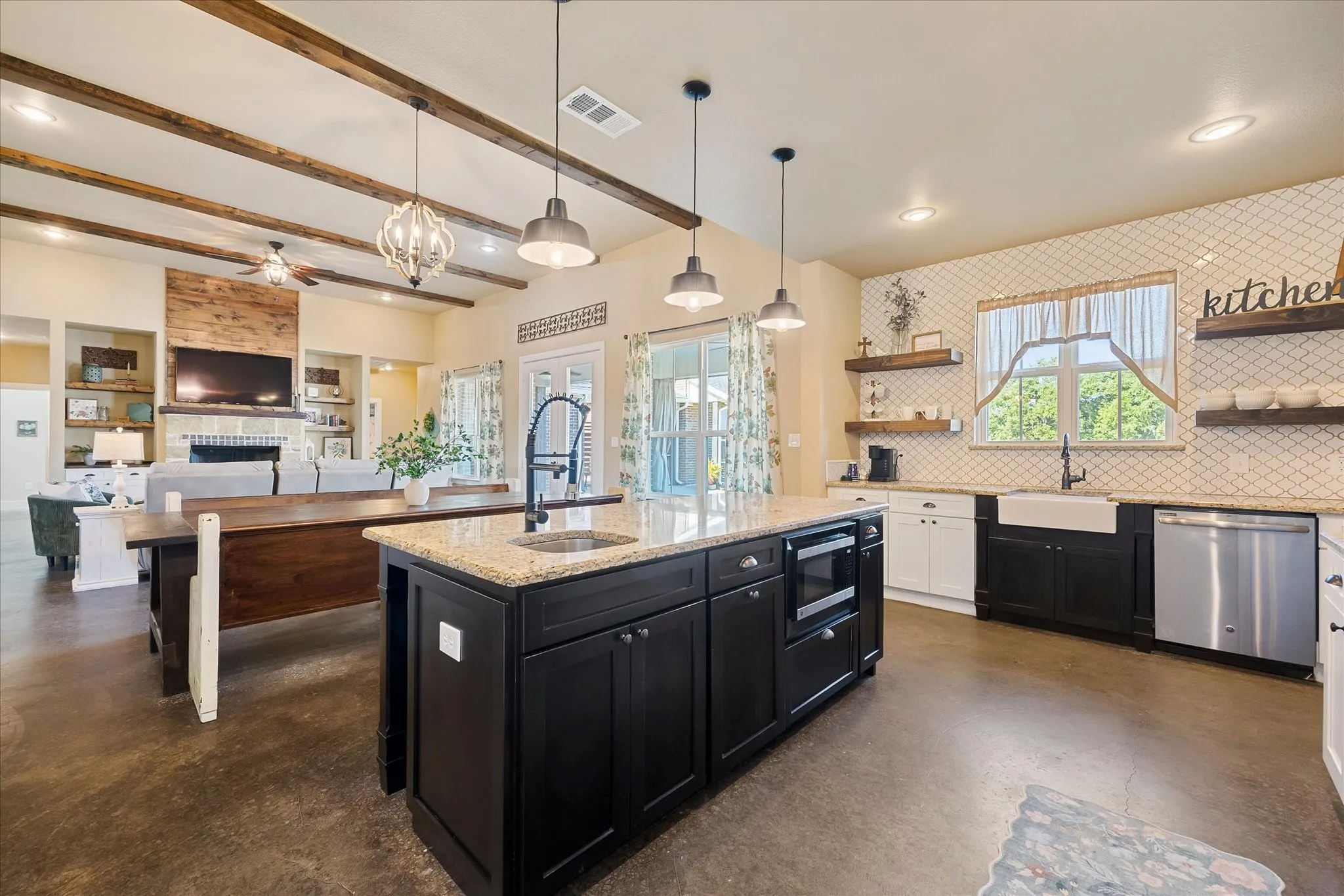 The open-concept design allows you to stay connected to family and friends while working in the kitchen.