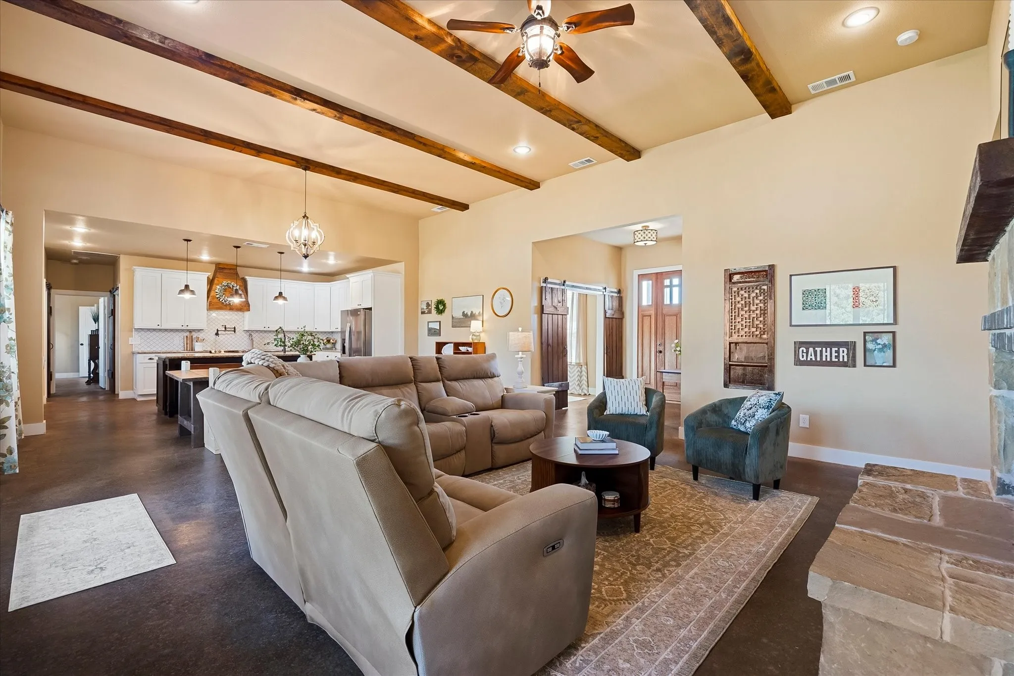 Easy-care stained concrete flooring flows throughout the home.