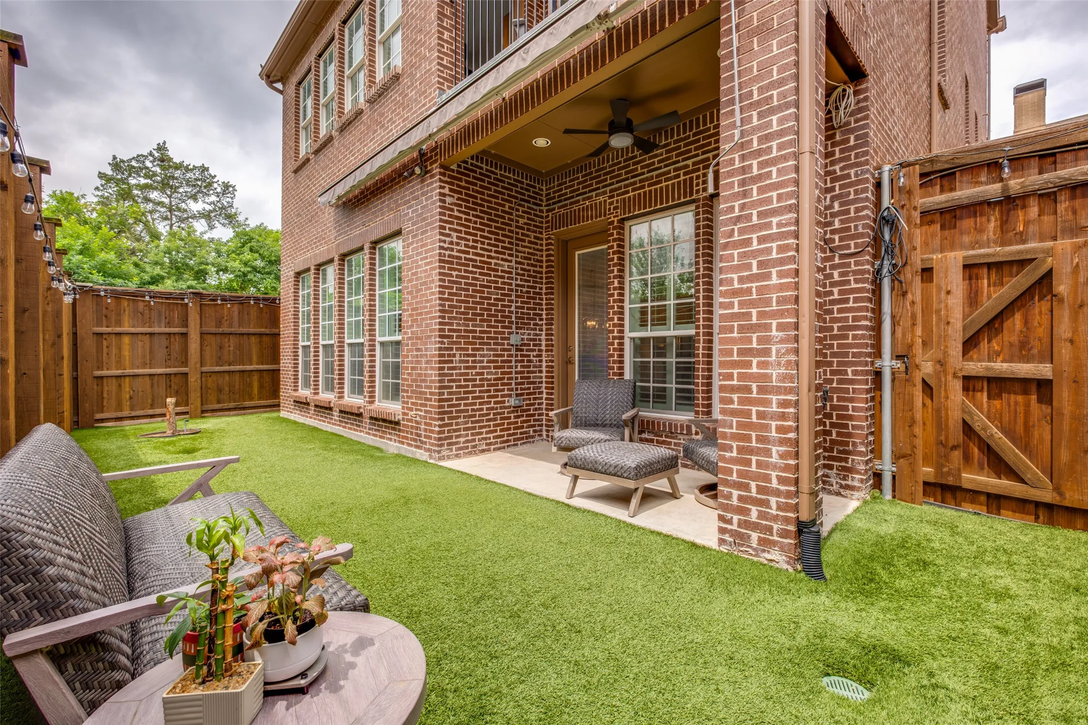 Low maintenance yard that looks perfect all the time because of the artificial turf