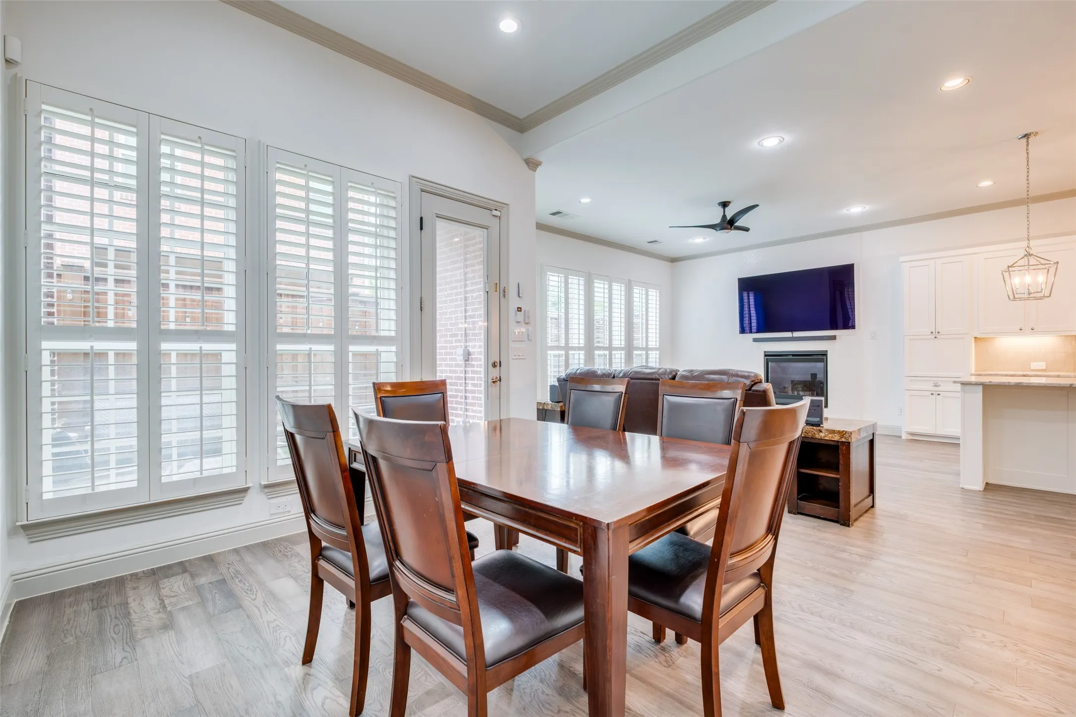 Nice size dining room with lots of windows and crown molding