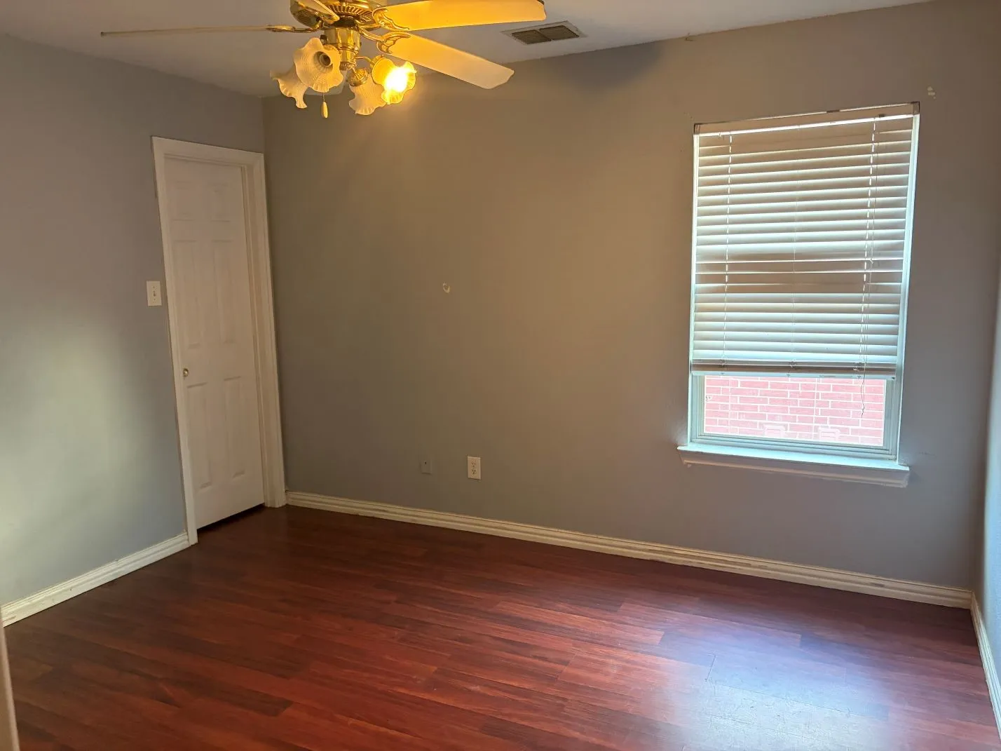 Wood-finish flooring with light-toned walls