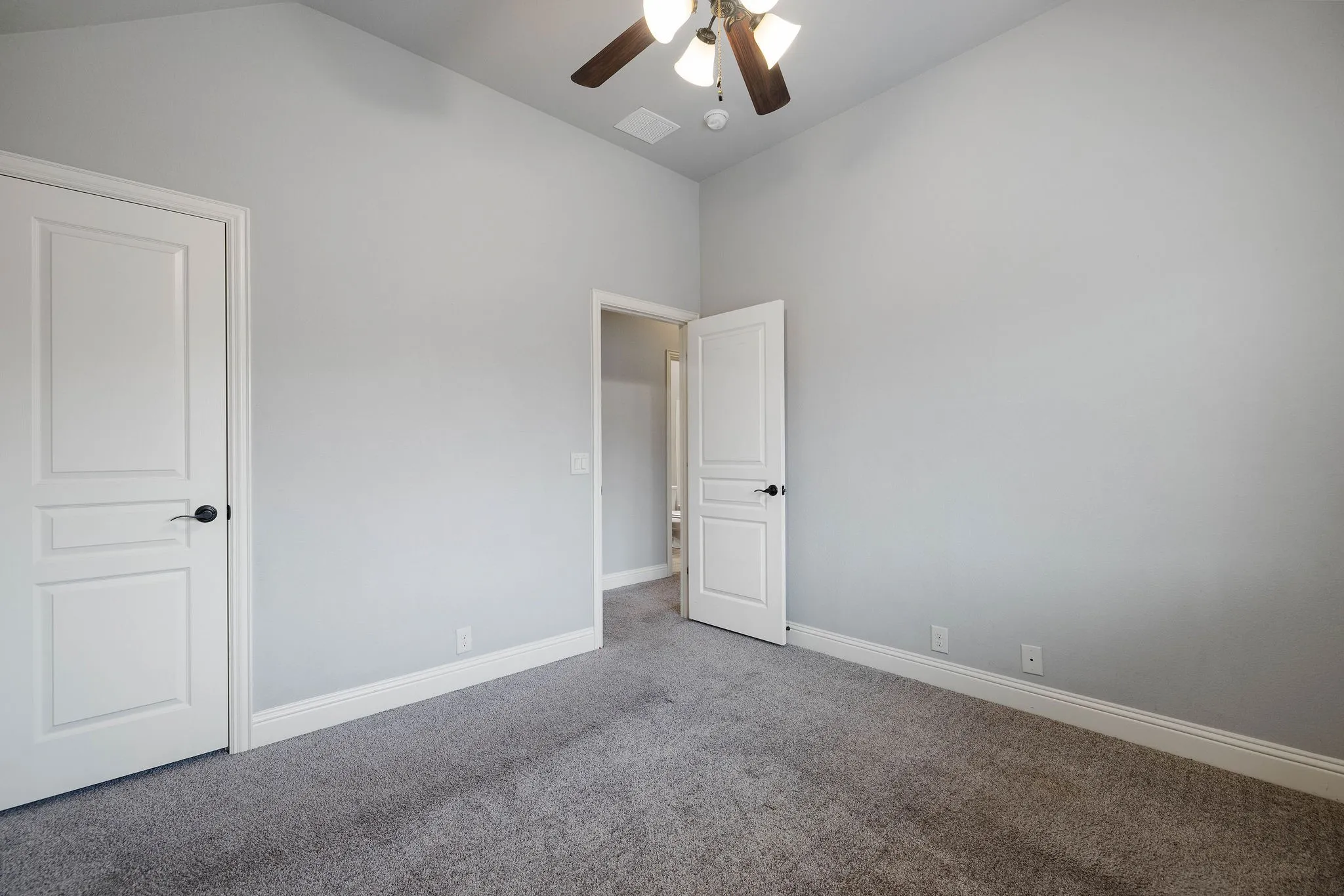Bedroom2 room with carpet, lofted ceiling, and ceiling fan
