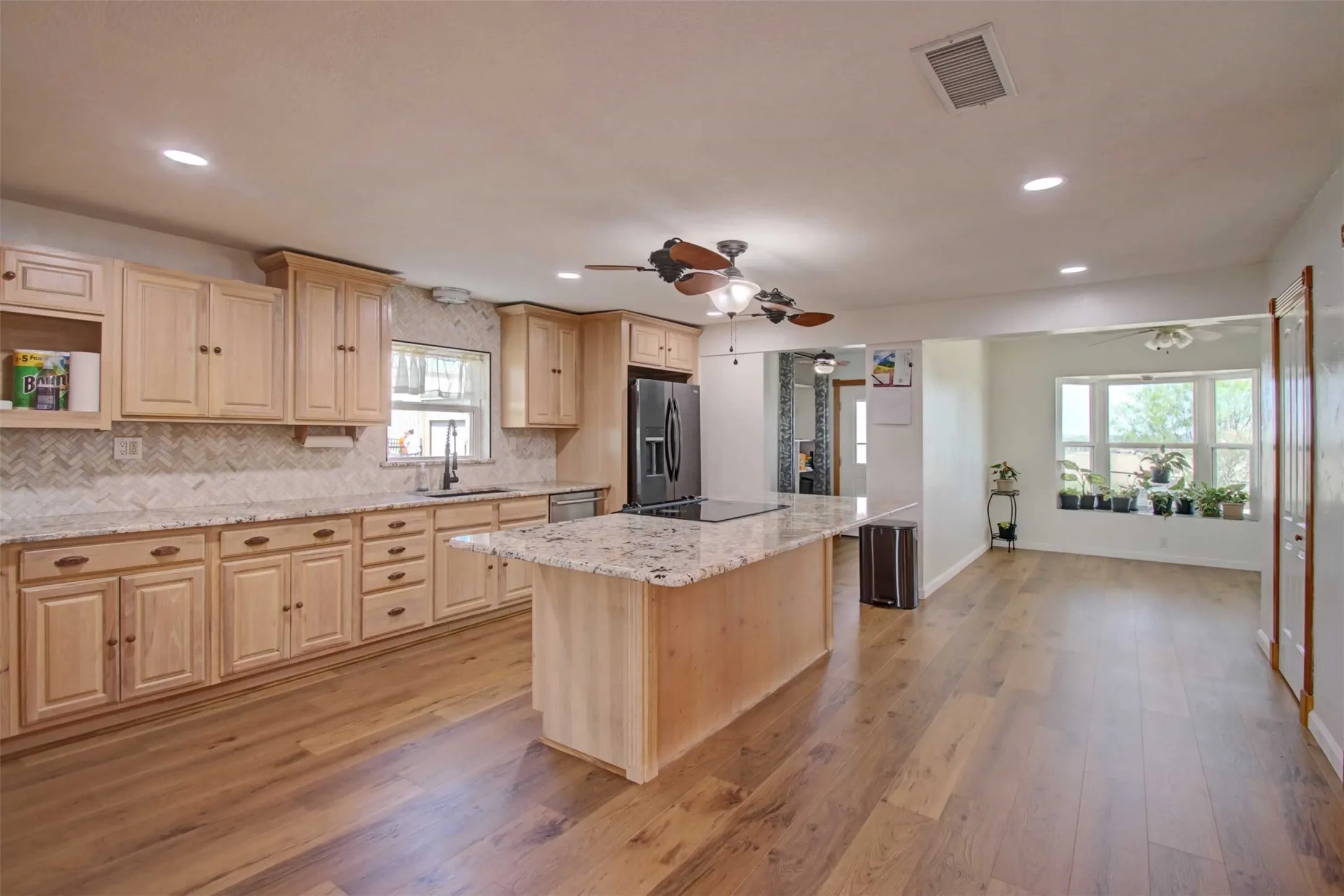 View of the kitchen and formal dining room.