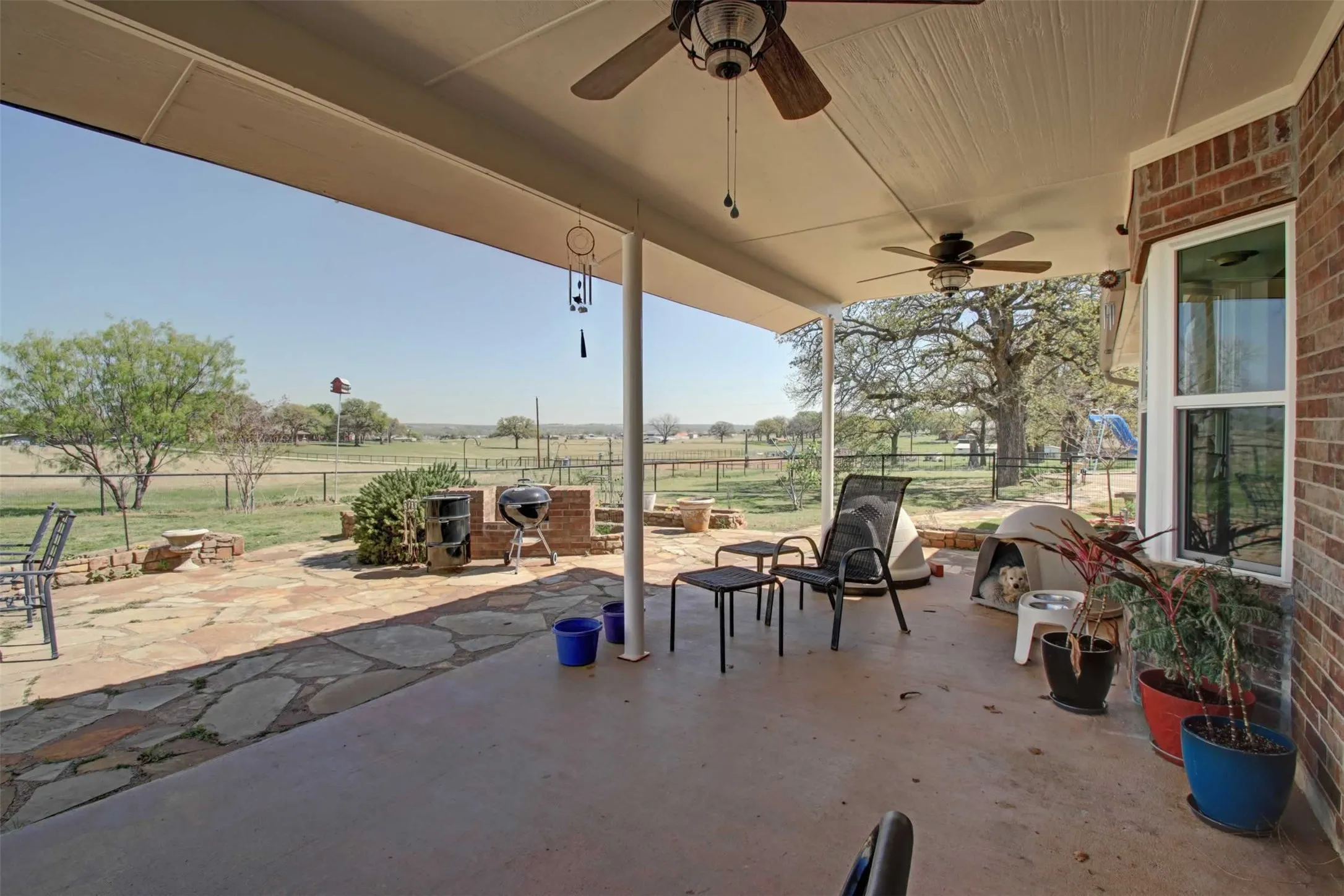 Great patio to watch what's happening in the pasture or the barns. The extended open area is a perfect place for your grill