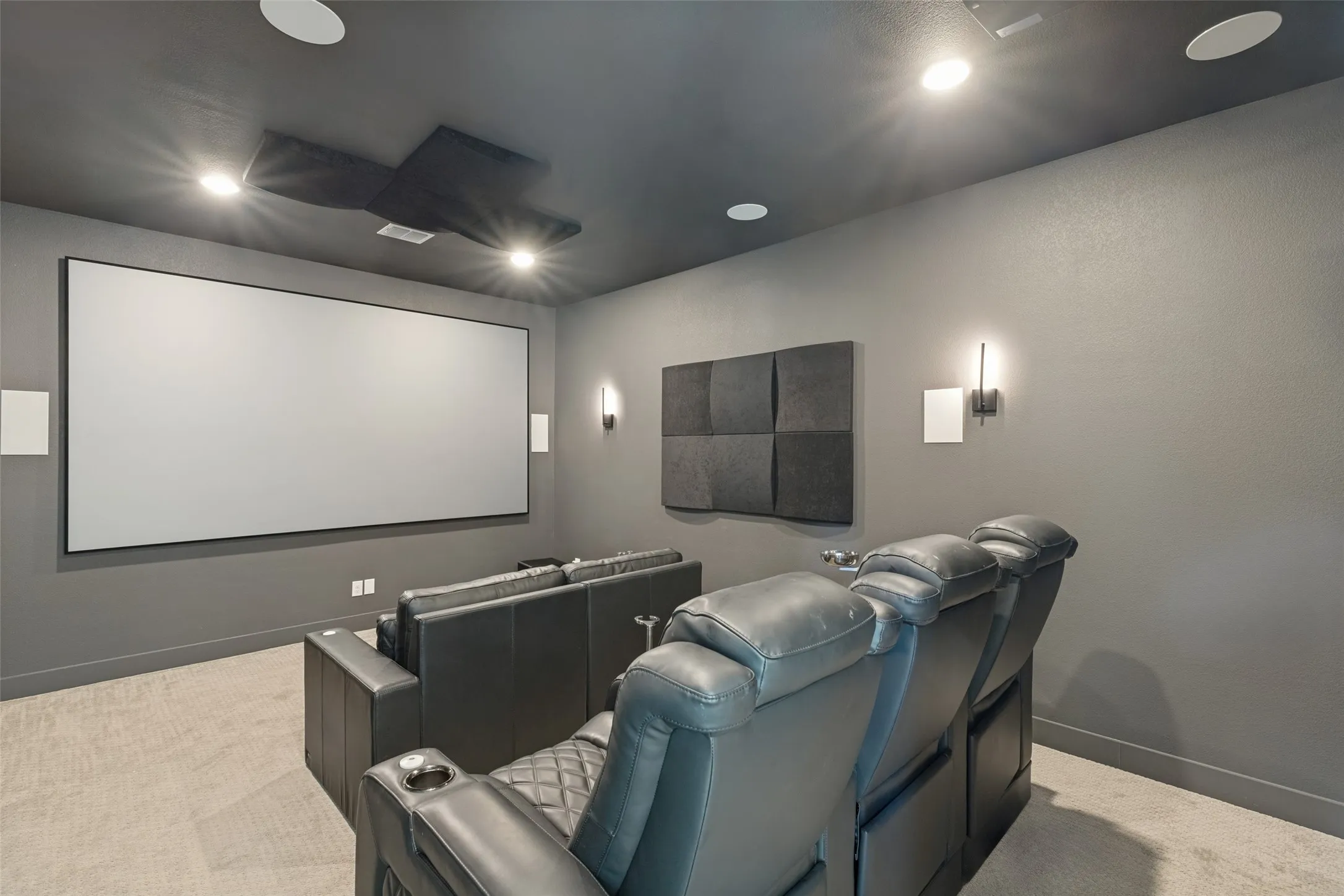 Downstairs Media Room complete with Chairs and Sound Proofing