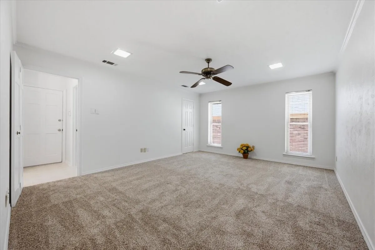 Bedroom #4 and/or game room area which is close to the garage; huge walk in closet - west side of the home