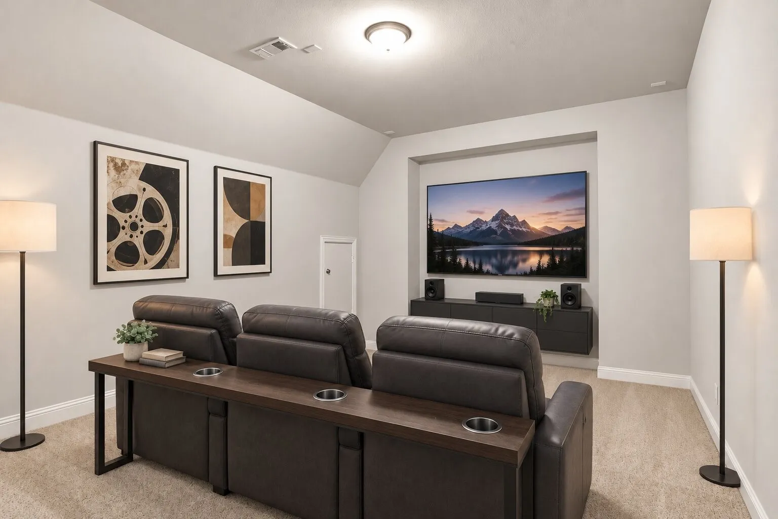 Spacious upstairs media room with a vaulted ceiling and dedicated space for an immersive home-theater setup. Virtually staged; furnishings, electronics, and décor are not included.