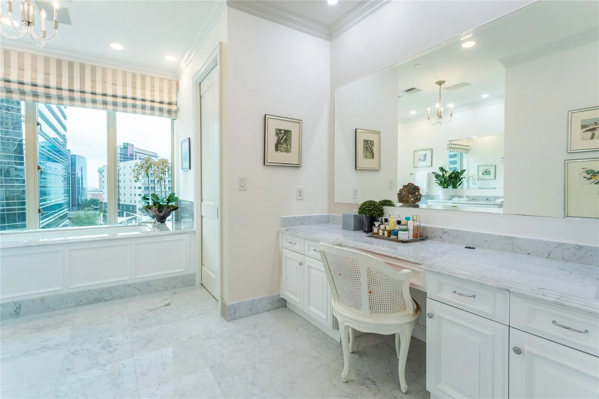 First Primary Bath has large make-up vanity, private water closet, jetted garden tub.