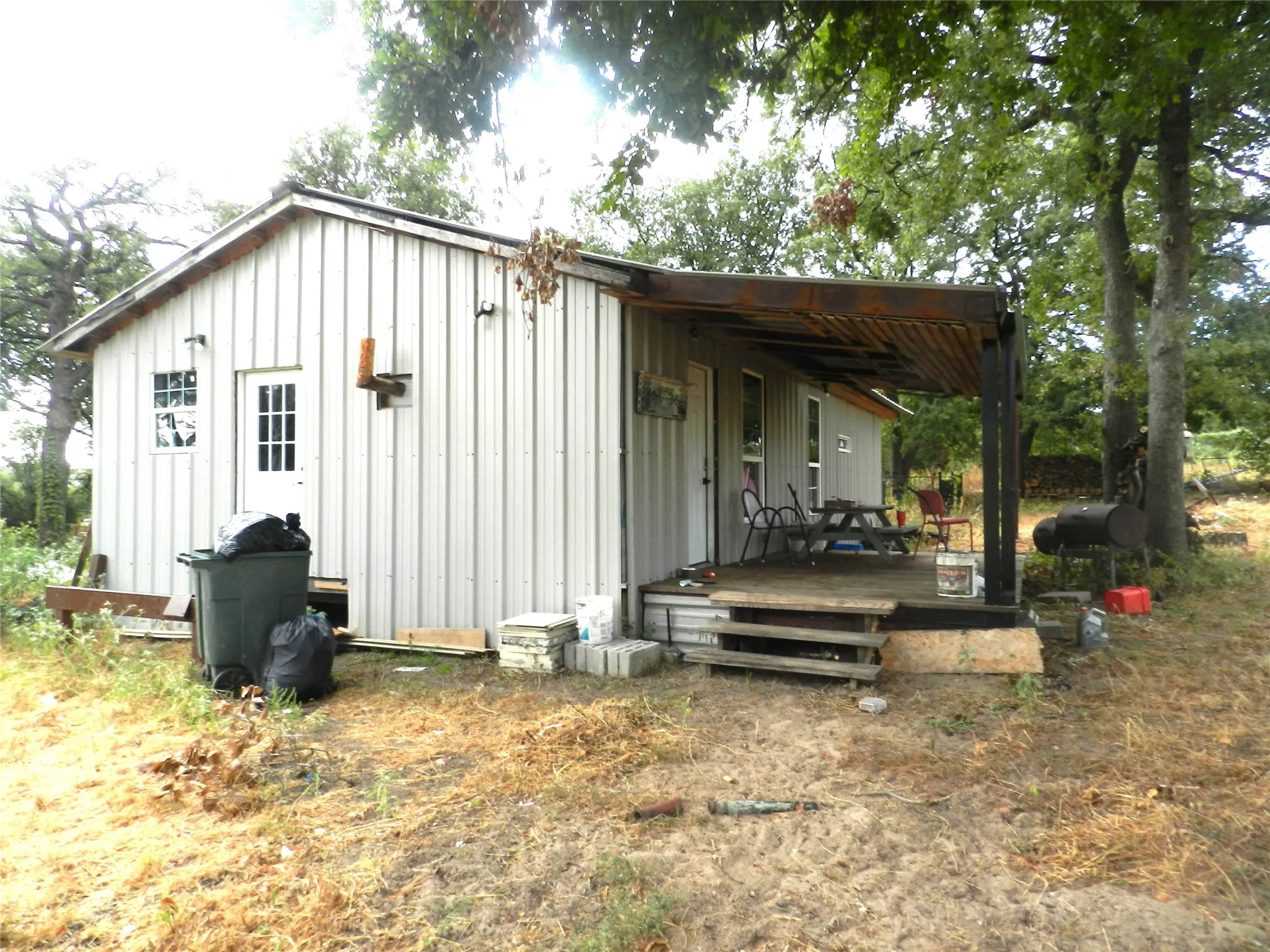 Metal siding exterior with a gabled roofline