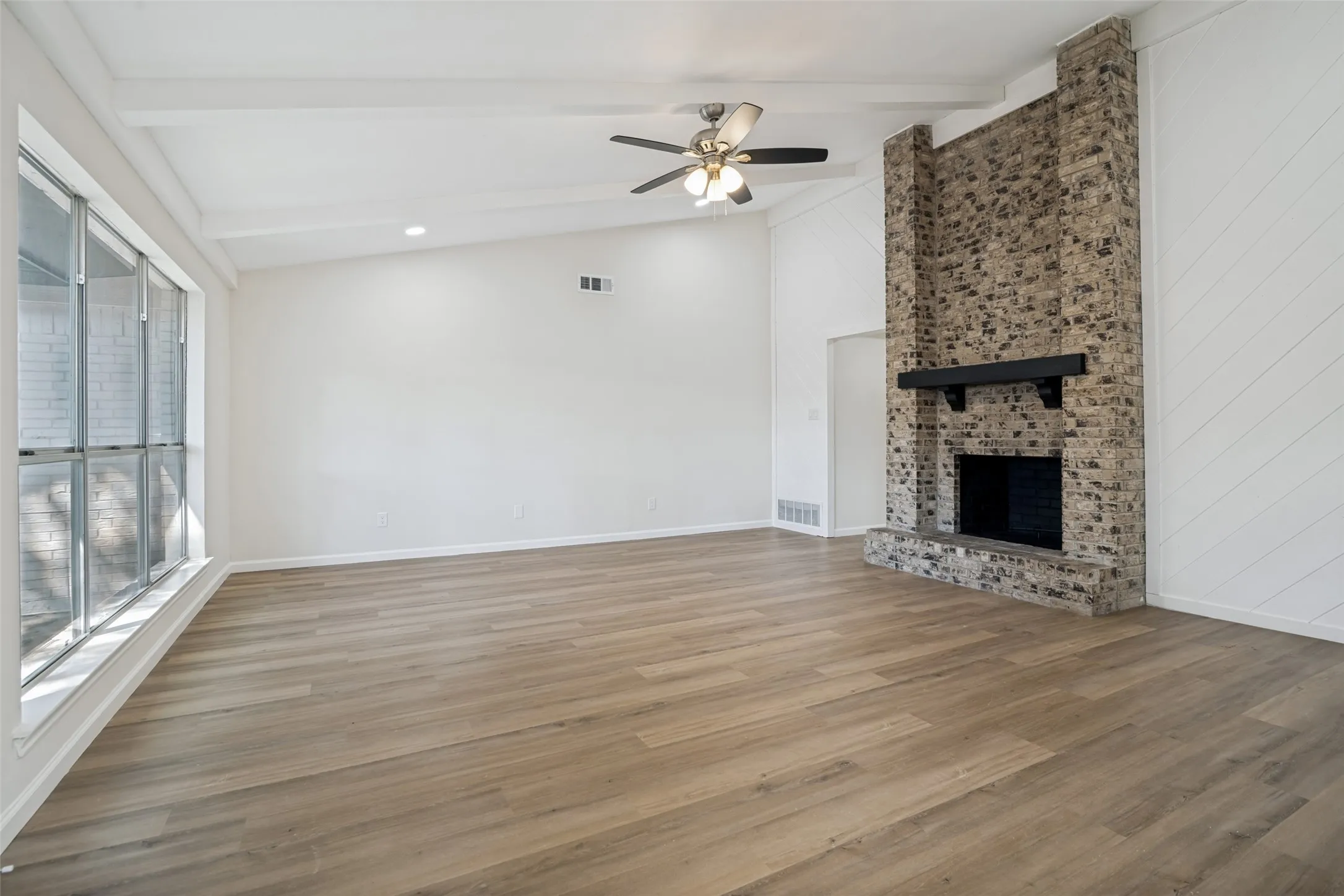 Large living room with vaulted ceiling