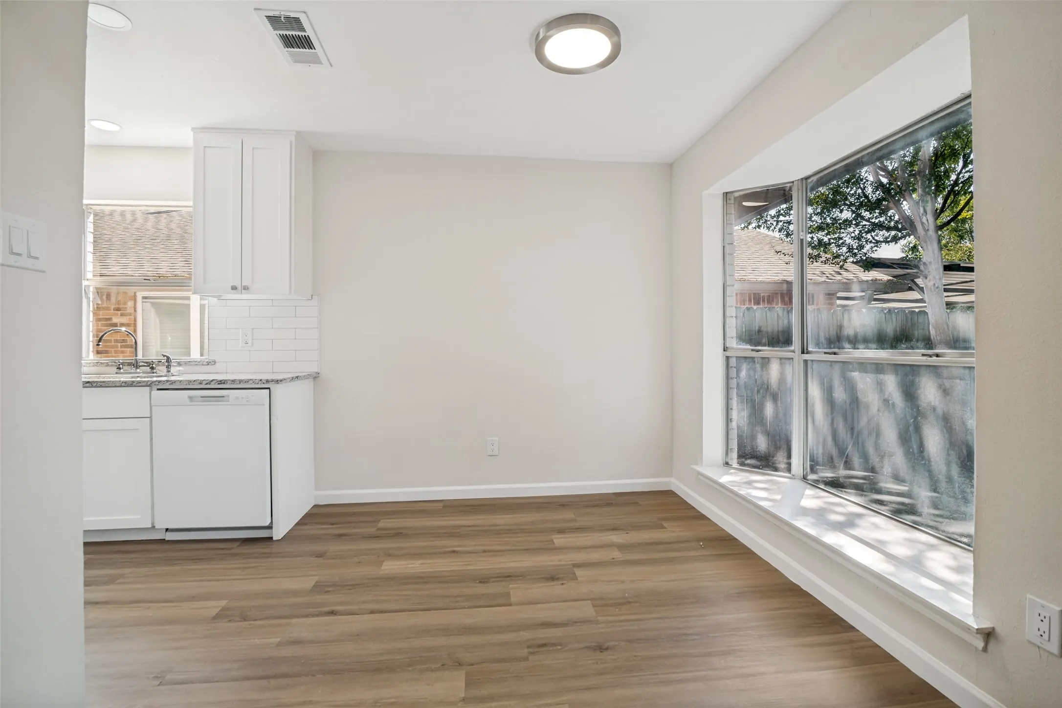 Breakfast nook with bay windows