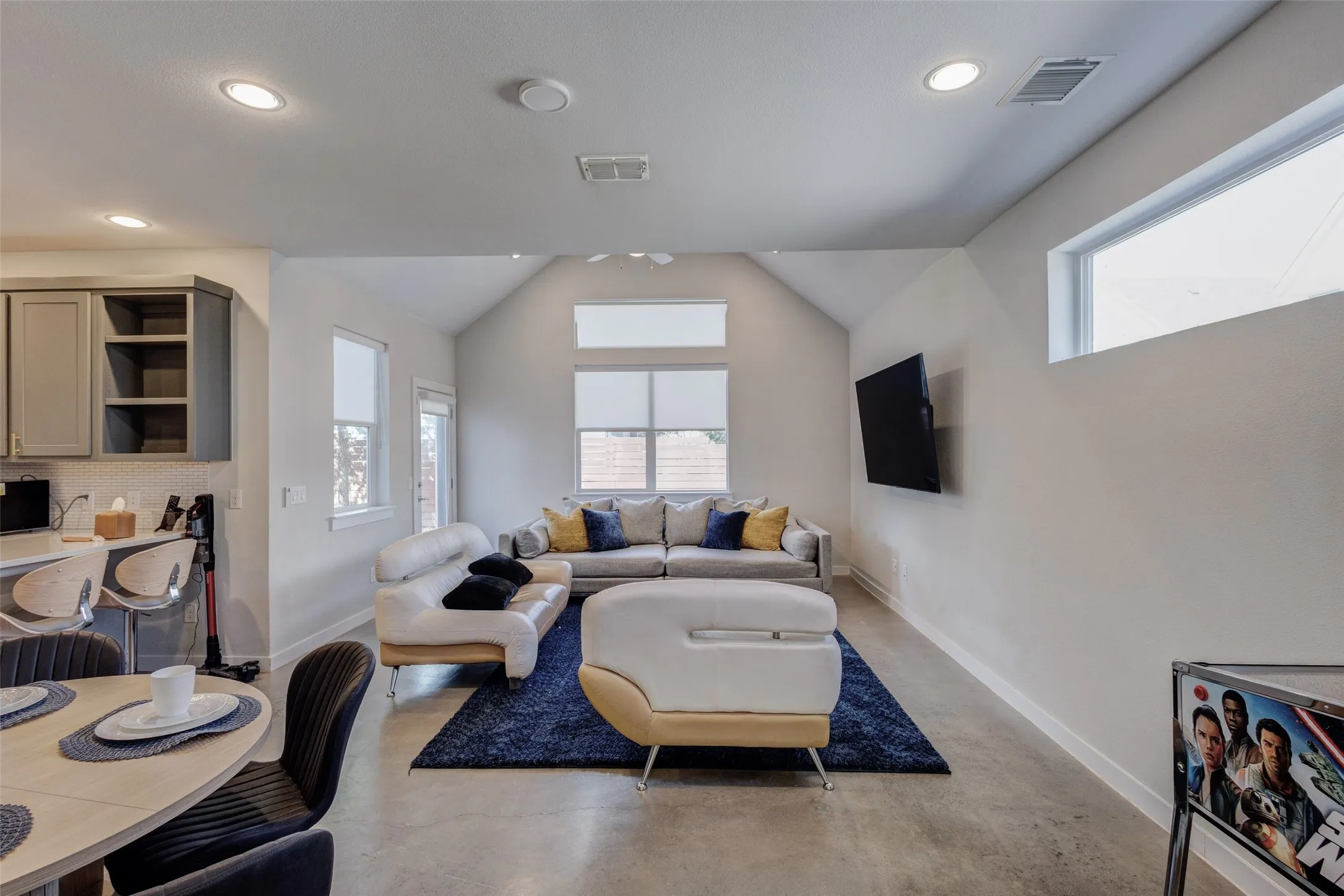 Living room with vaulted ceiling
