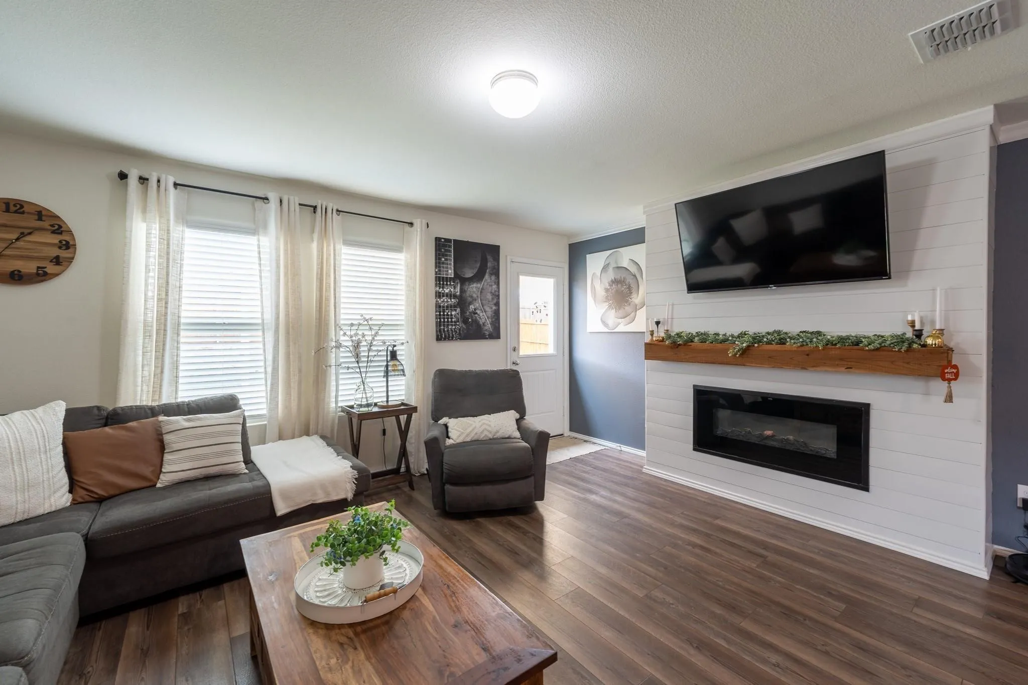 Living room featuring dark hardwood / wood-style floors