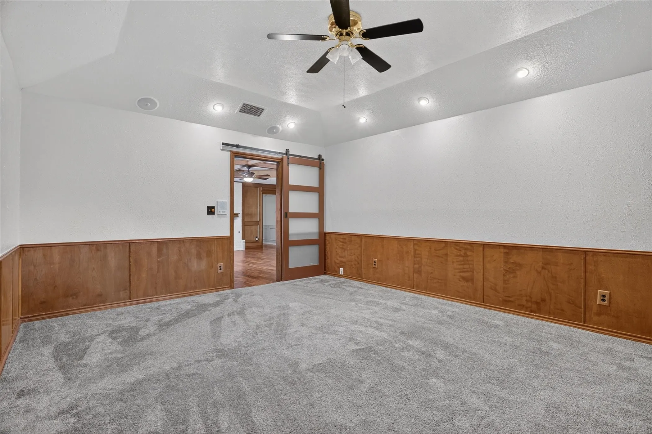 Another versatile room that leads to the stairs for the upstairs bedrooms