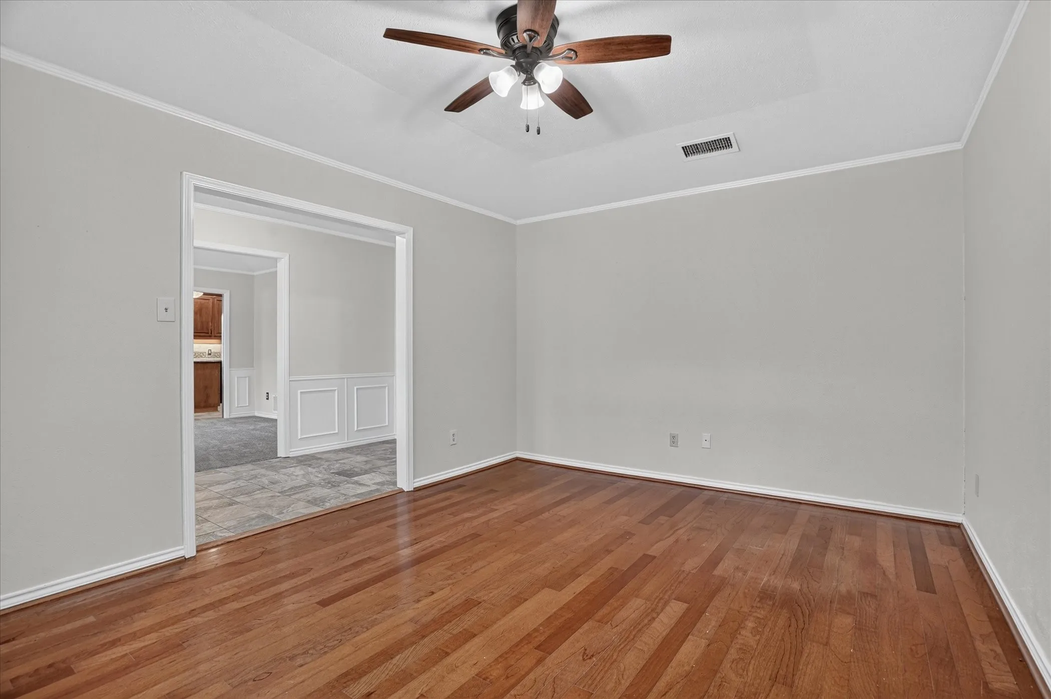 This room off the entryway could be used as an office or extra seating area
