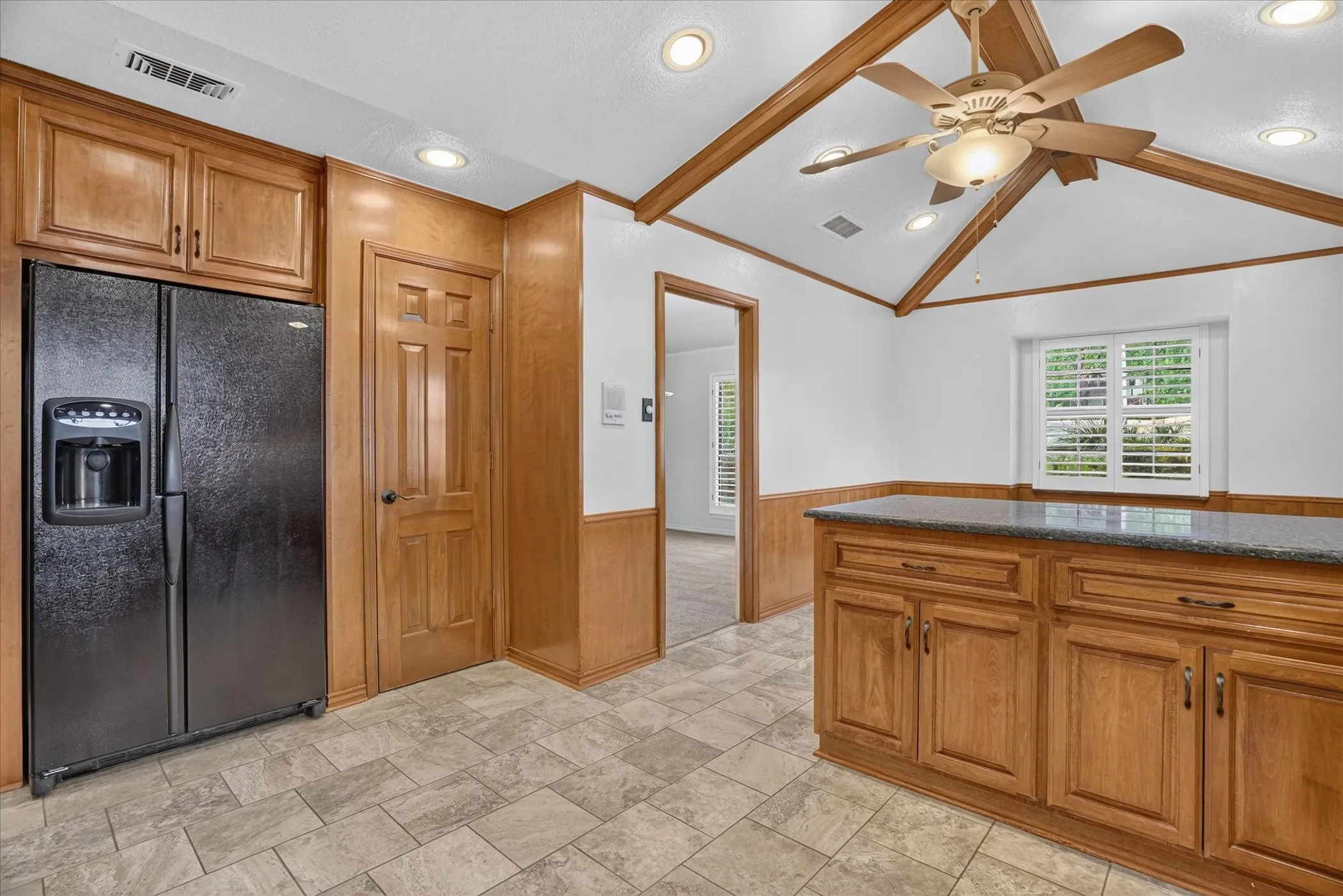 Kitchen featuring granite countertops, double oven, and plenty of space