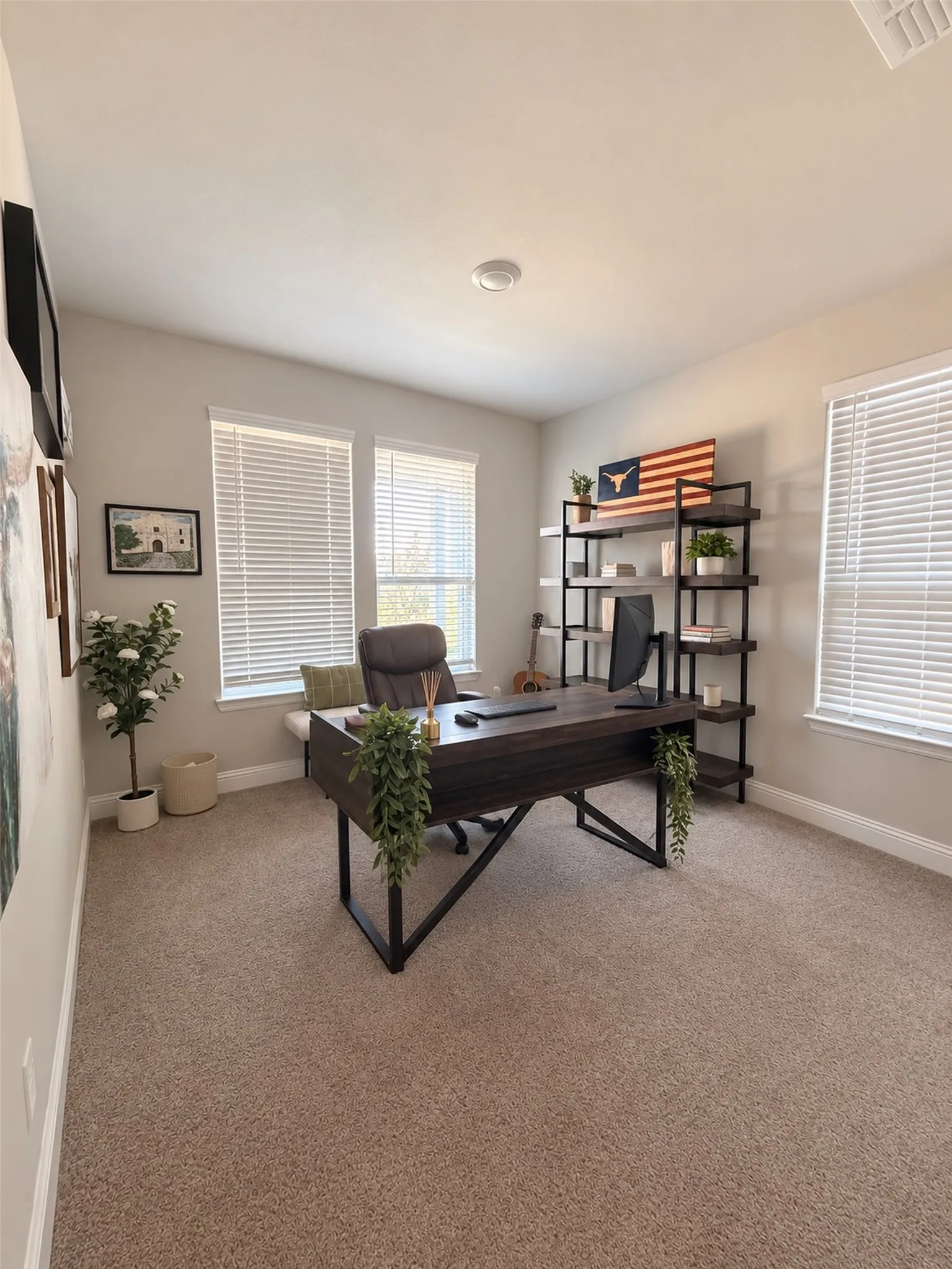 Carpeted room featuring multiple windows with blinds, a built-in window bench, and recessed ceiling lighting