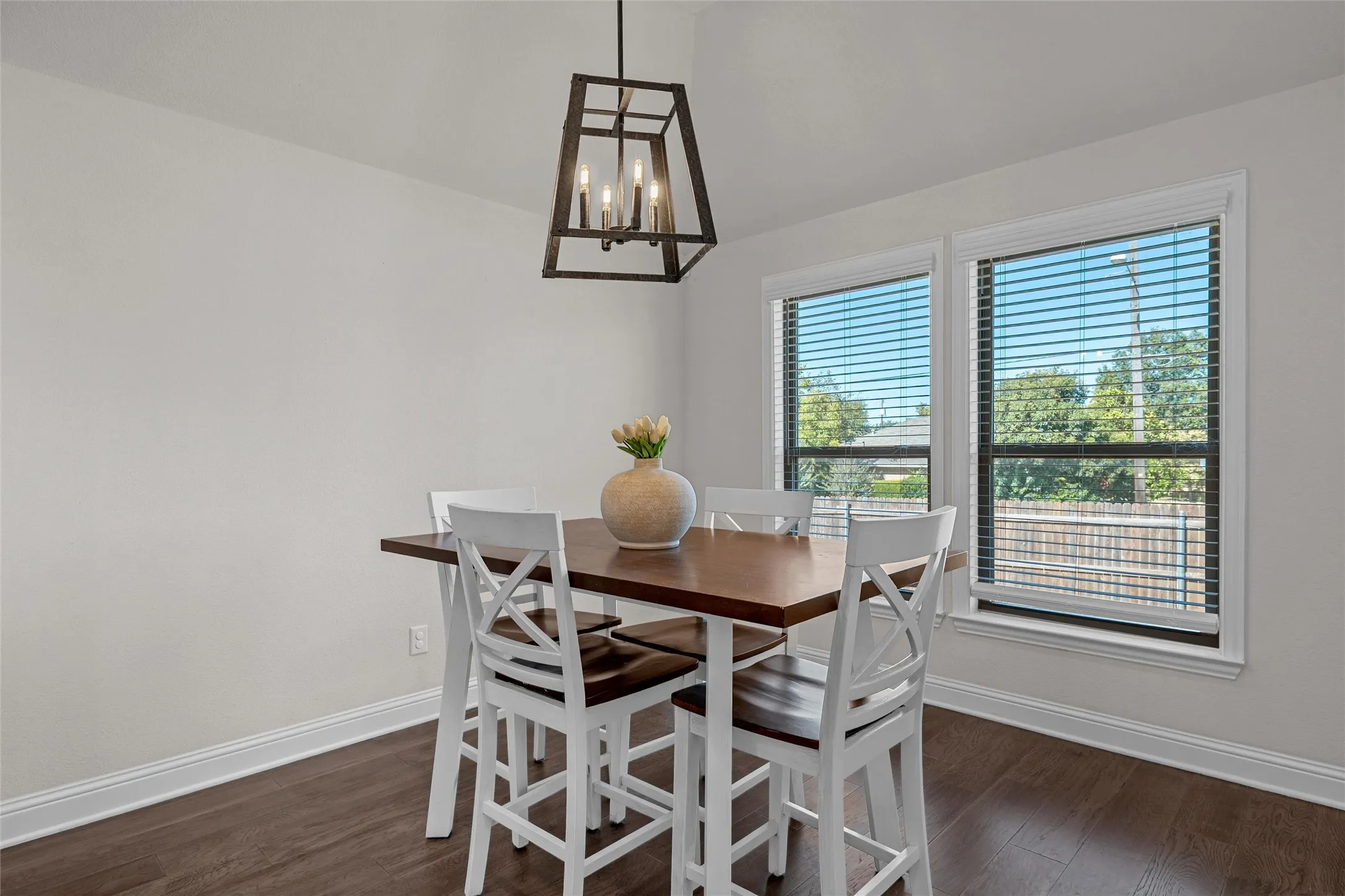 Wood-finish flooring with crisp white trim