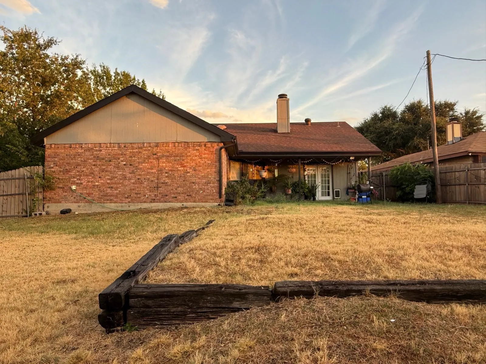 Brick and siding exterior with a gabled roof