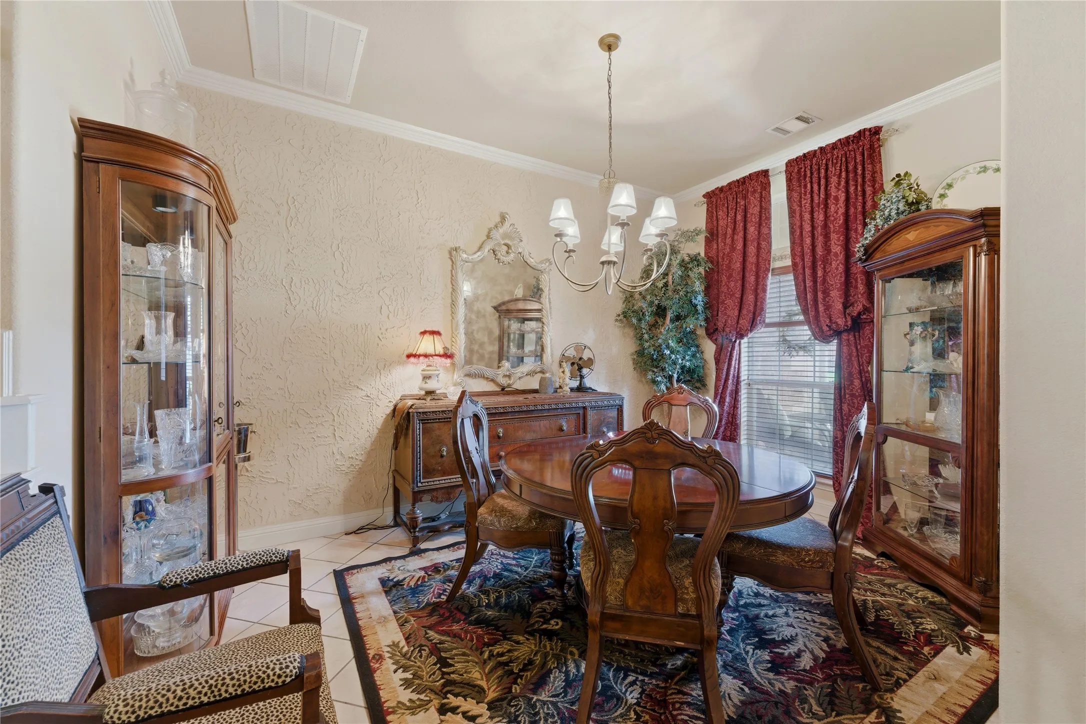 Crown molding accents above textured walls