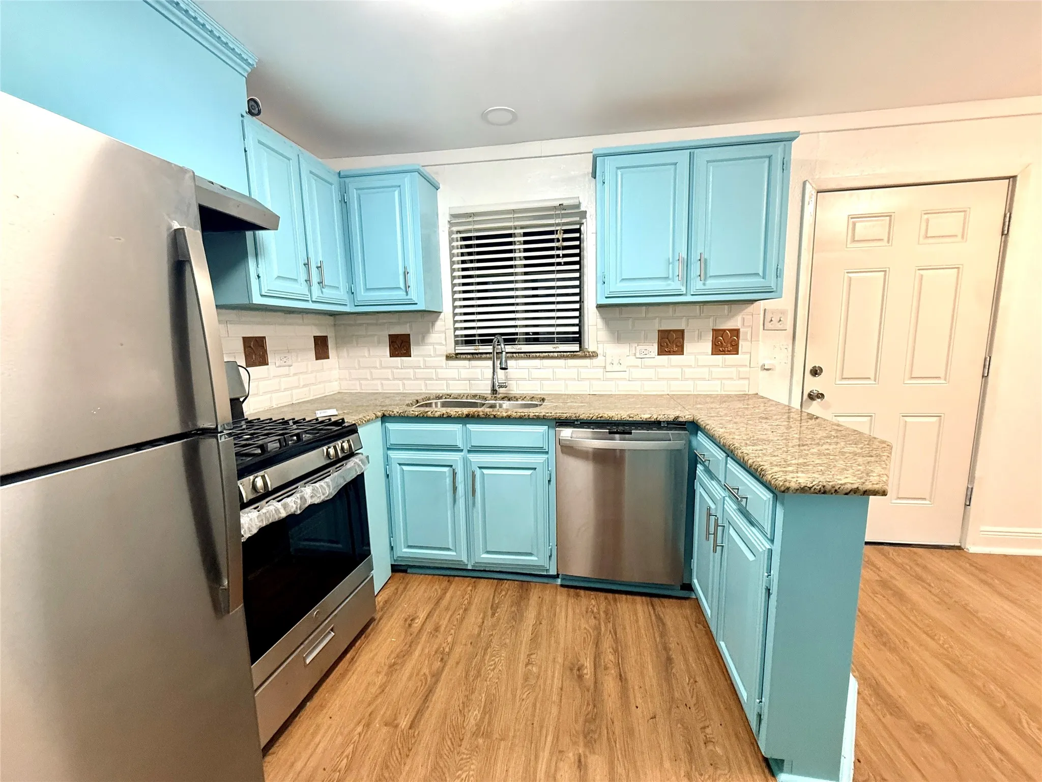 new gas range, refrigerator, and dishwasher