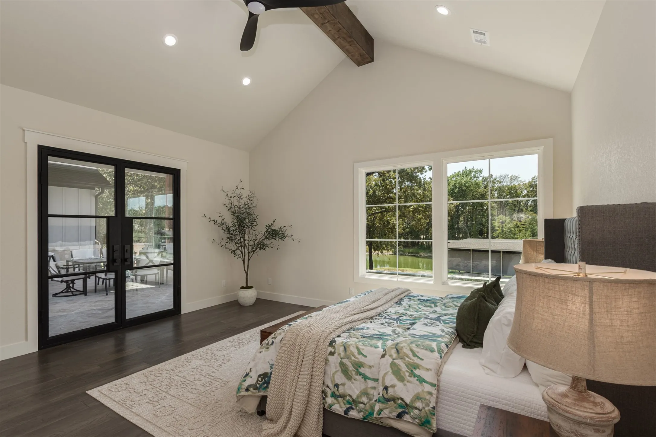 Vaulted ceiling with an exposed wood beam