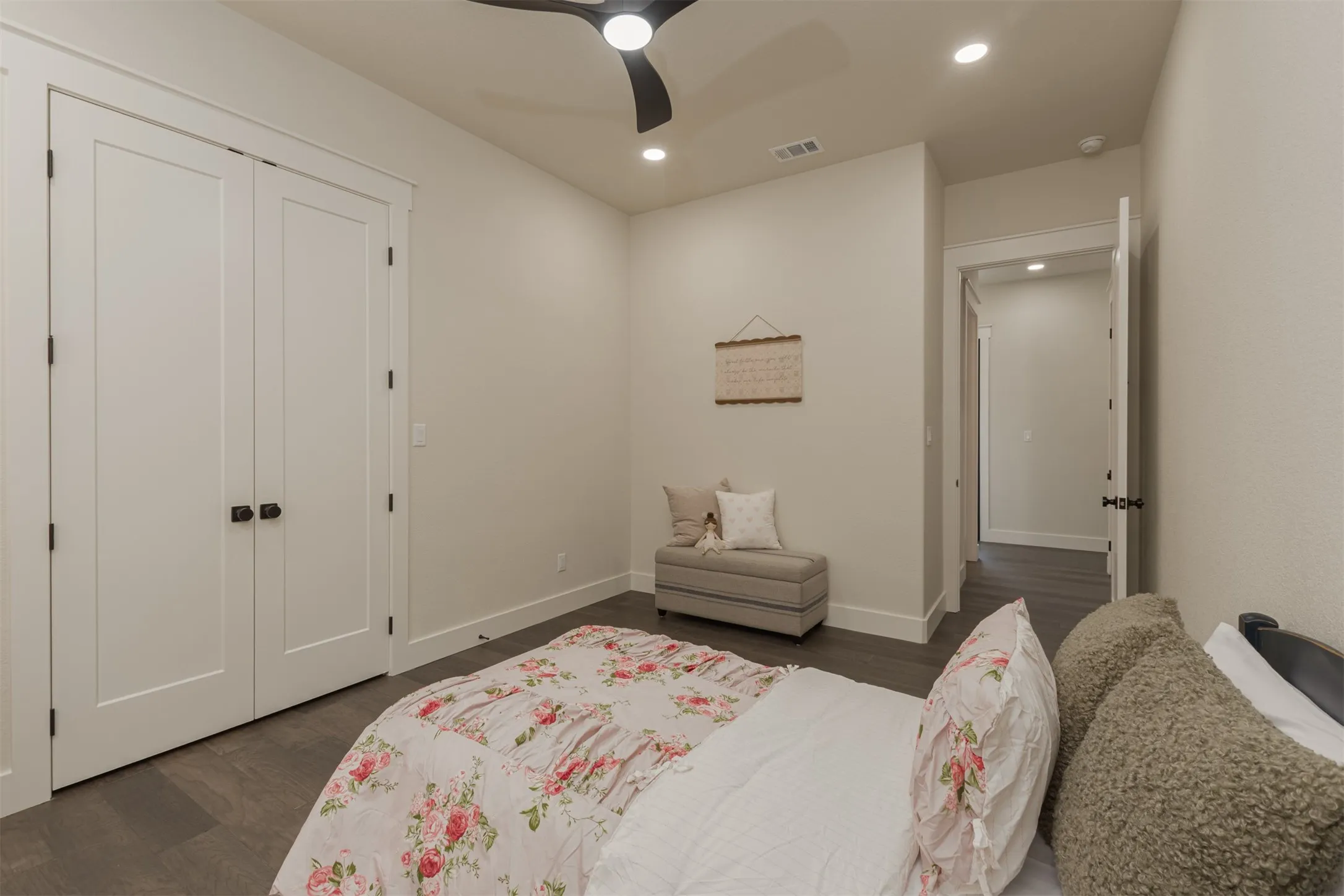 Recessed lighting, dark wood-finish flooring, white trim, and a ceiling fan with integrated lighting