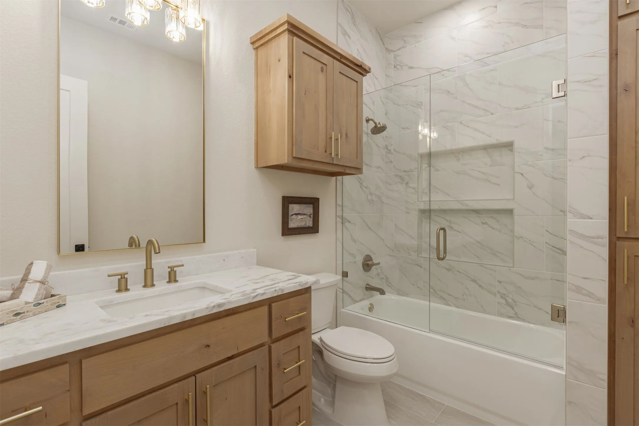 Light wood-finish vanity with a white countertop and rectangular sink