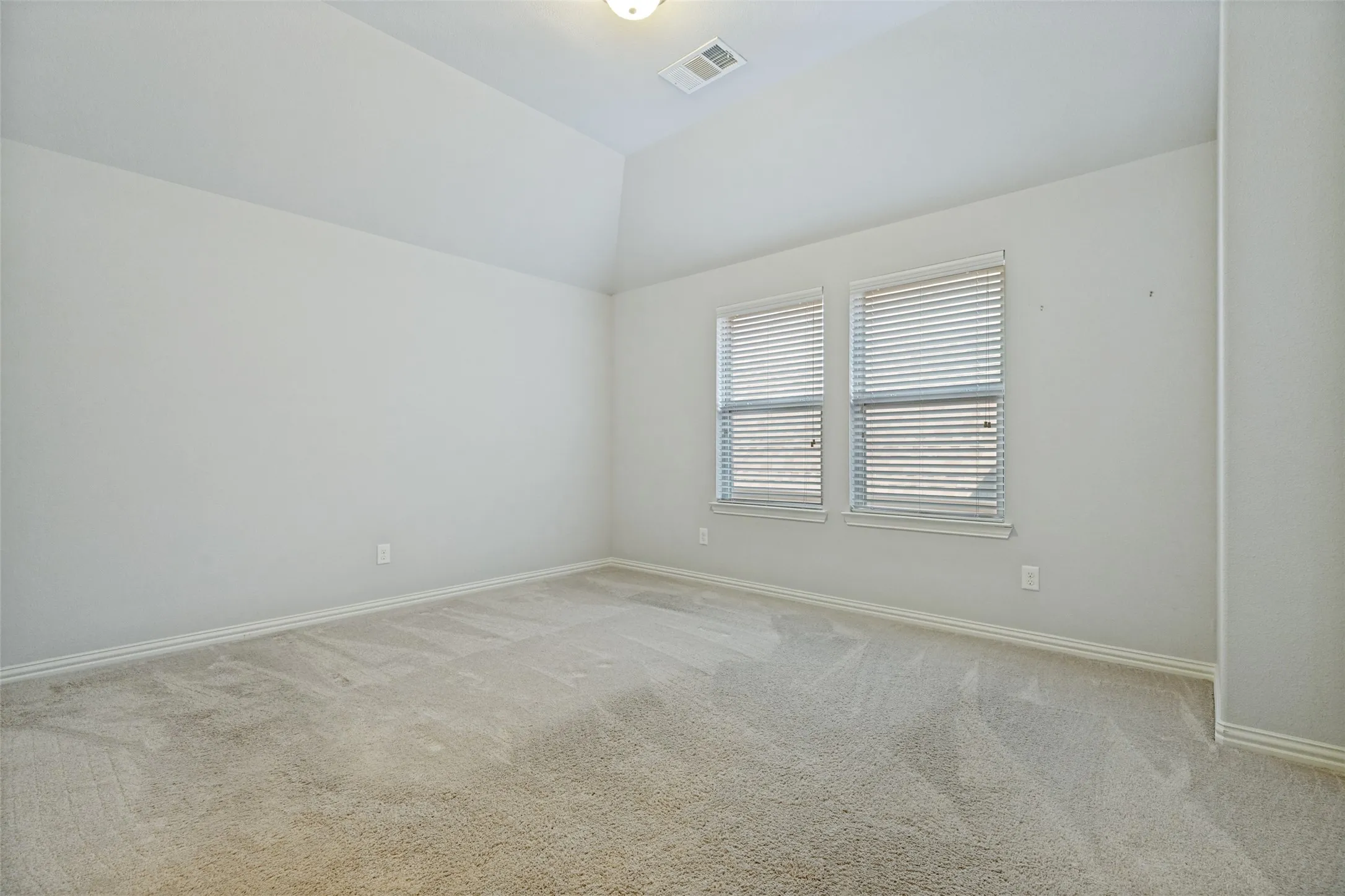 The secondary upstairs bedrooms boast generous square footage, providing an abundance of space for comfort and versatility.