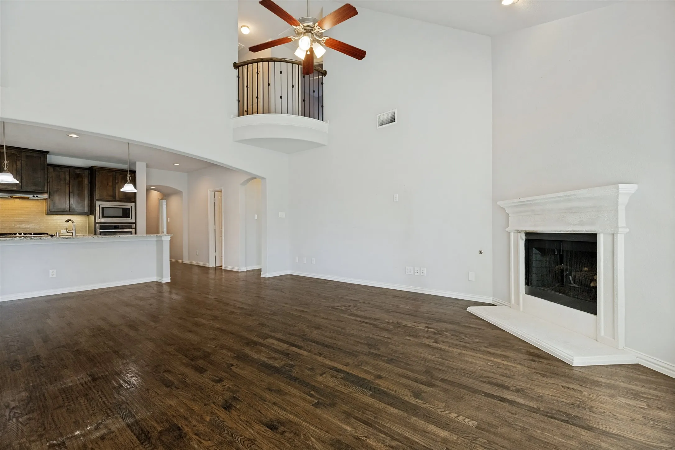 A picture's worth a thousand words! The open concept living area seamlessly connects the kitchen to the breakfast area and living room. Perfect for family gathering or get-togethers with friends and associates.