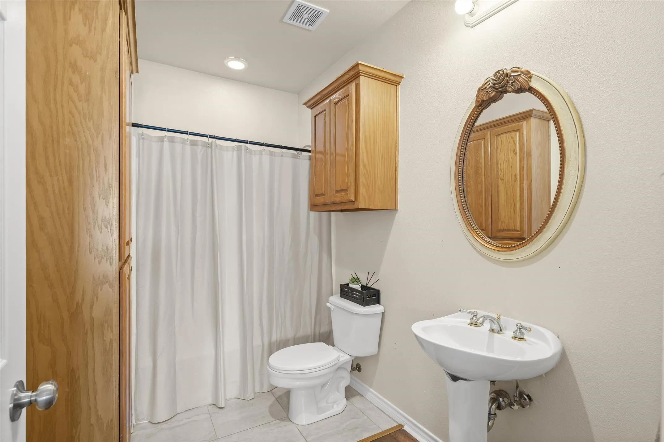 Bathroom within the home’s private guest wing