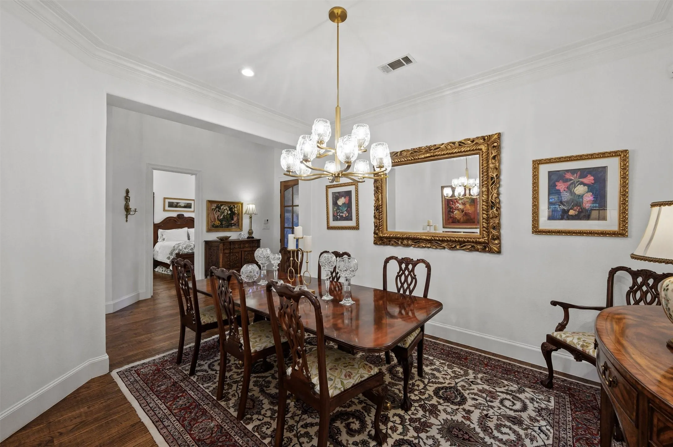 Hardwood flooring, crown molding, and recessed lighting
