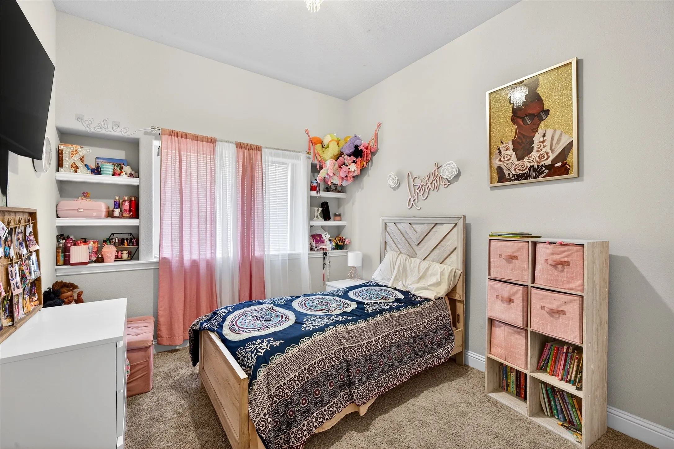 Recessed wall shelving, neutral wall paint, and light-colored carpeting